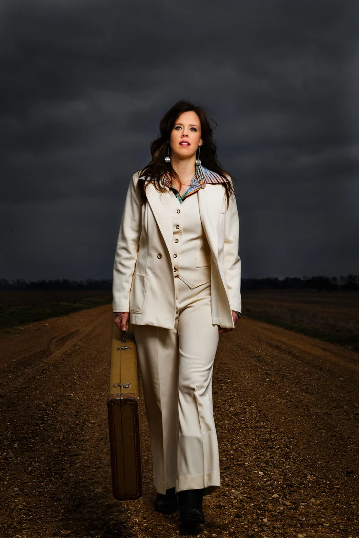 Singer and bass player Heather cut her teeth playing base for St. Thomas Jenkins in her early twenties. After his passing she played music in AR with several bands. Now living in Clarksdale, Mississippi, she fronts her own Blues band. She records, writes and fronts a band in the most energetic way.