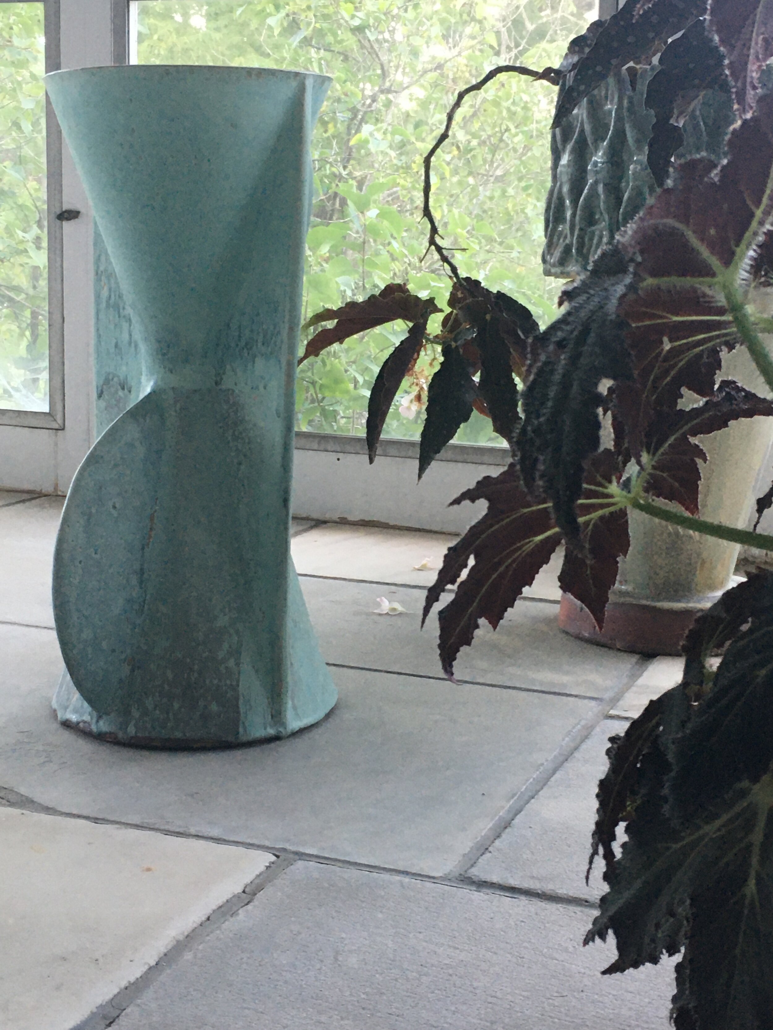 turq side table on porch.JPG