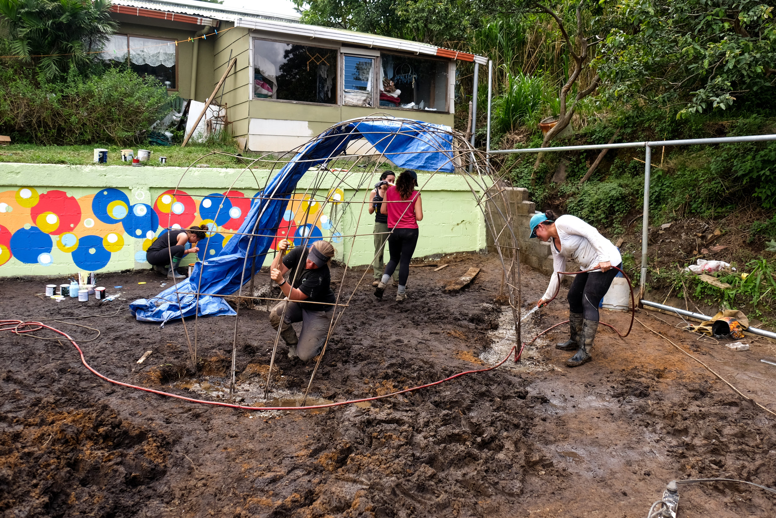 rebar cemented into concrete footings and bent to create a dome structure