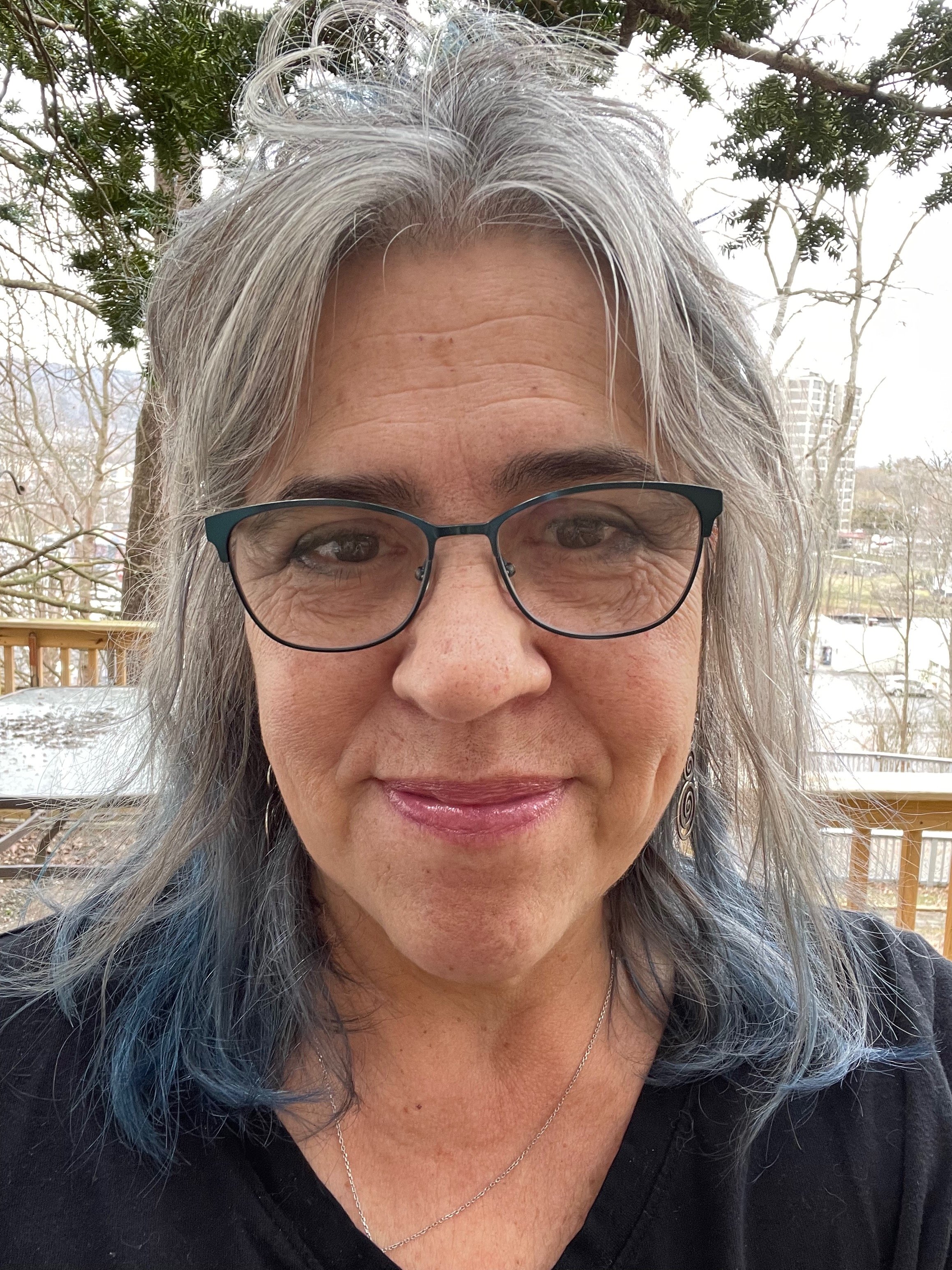 Carla Elizabeth on a deck on a snowy day