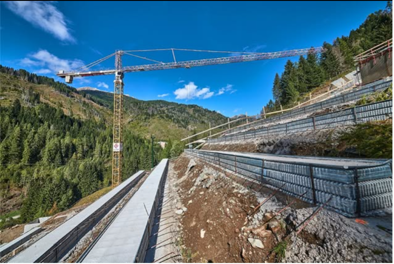 Photo of construction of a ski jump in Predazzo by aus_heavyquip_journal, via instagram