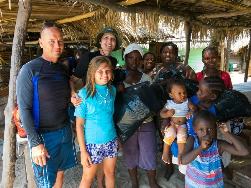 Our generous guests delivering school supplies to the locals of Chachahuate Island