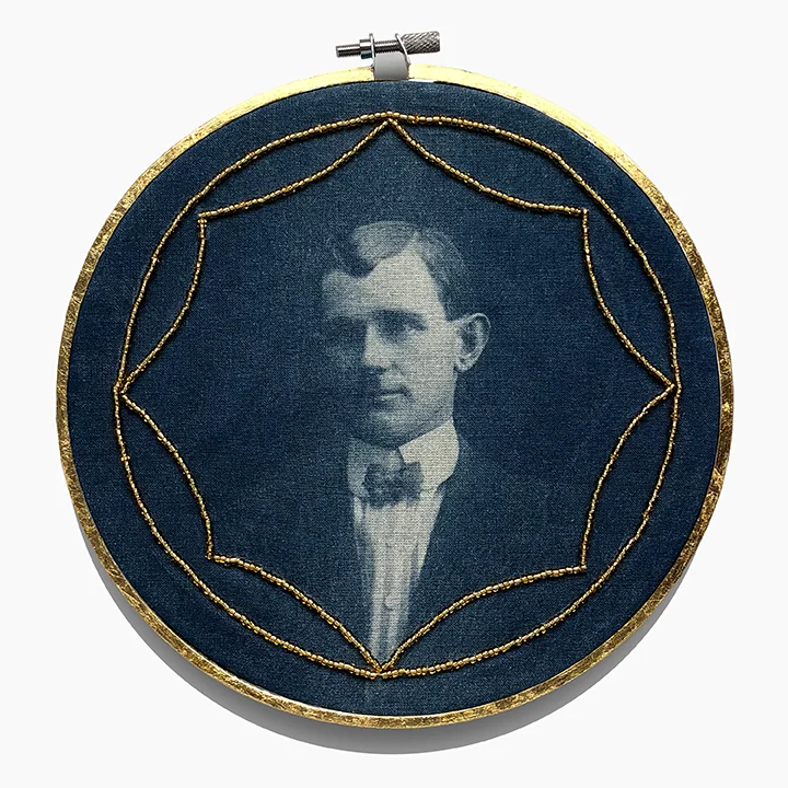 Cyanotype on cloth with gold beading in gold leafed embroidery hoop.