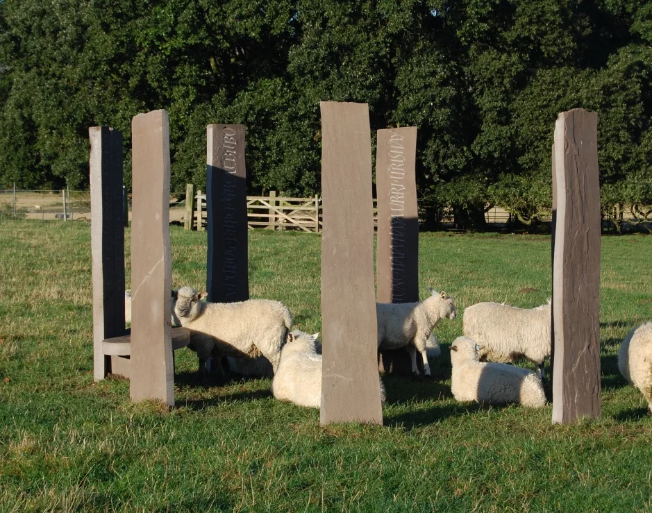 John-Neilsons-Circle-of-standing-stones-and-seat-1.jpg