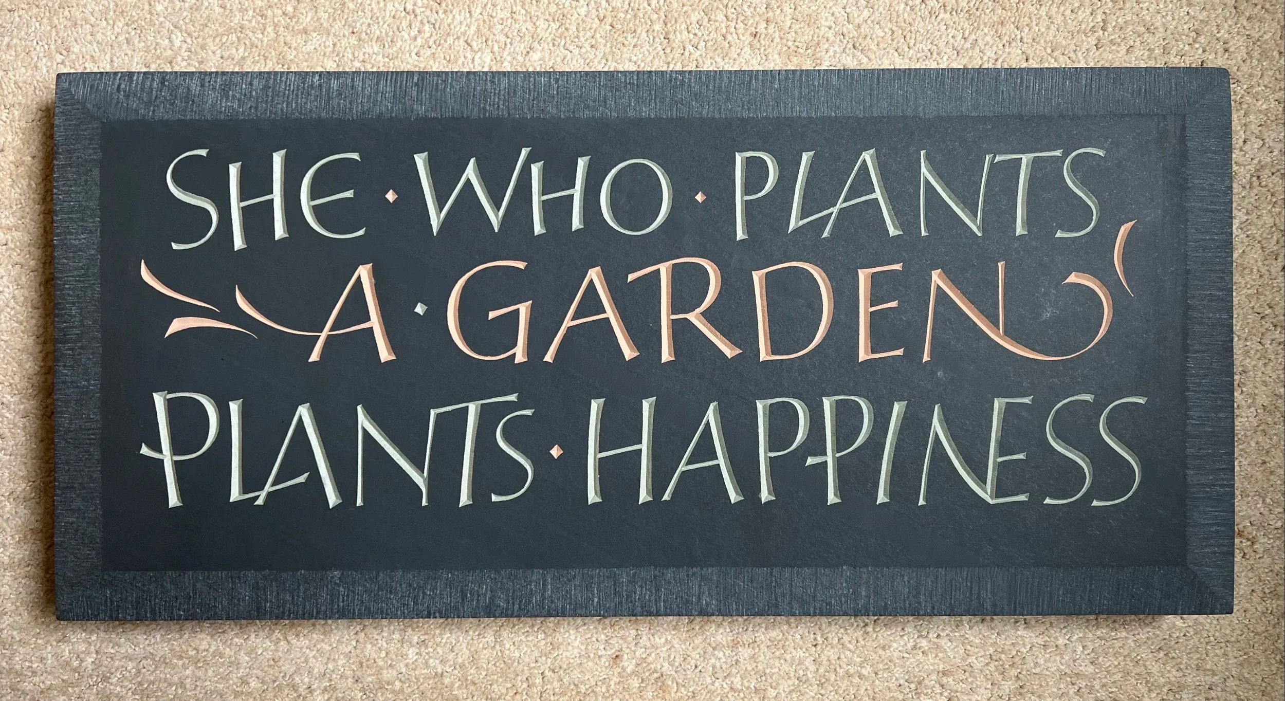 She who plants a garden plants happiness by Emi Gordon