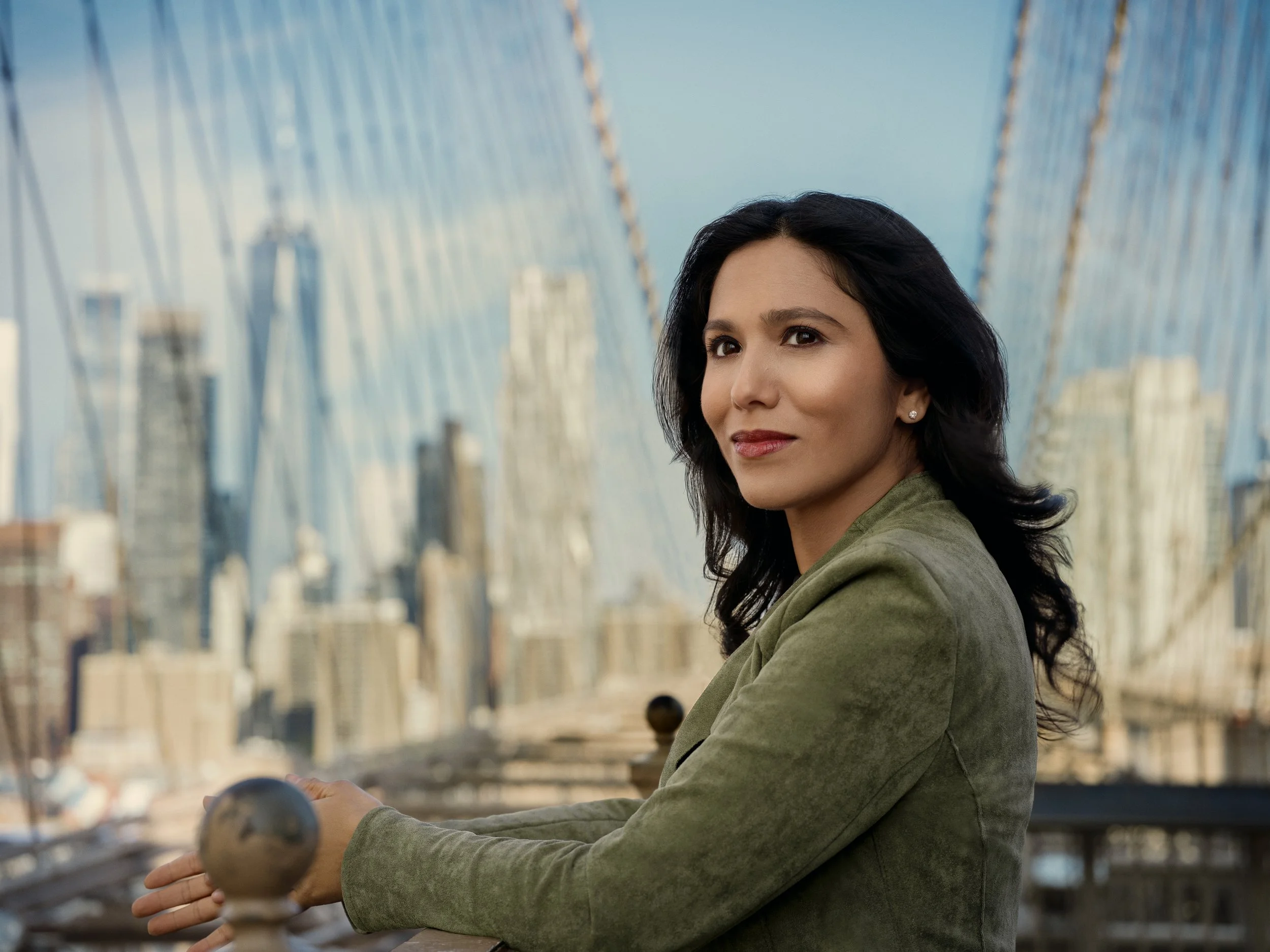 Sonali Basak, host of The Bridge by iCapital, photographed at Brooklyn Bridge by Taurat Hossain, NYC Fashion photographer.