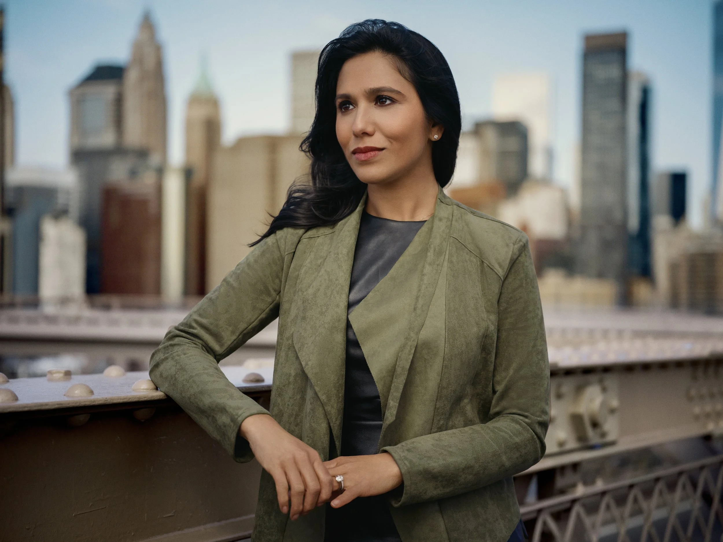 Sonali Basak, host of The Bridge by iCapital, photographed at Brooklyn Bridge by Taurat Hossain, NYC Fashion photographer.
