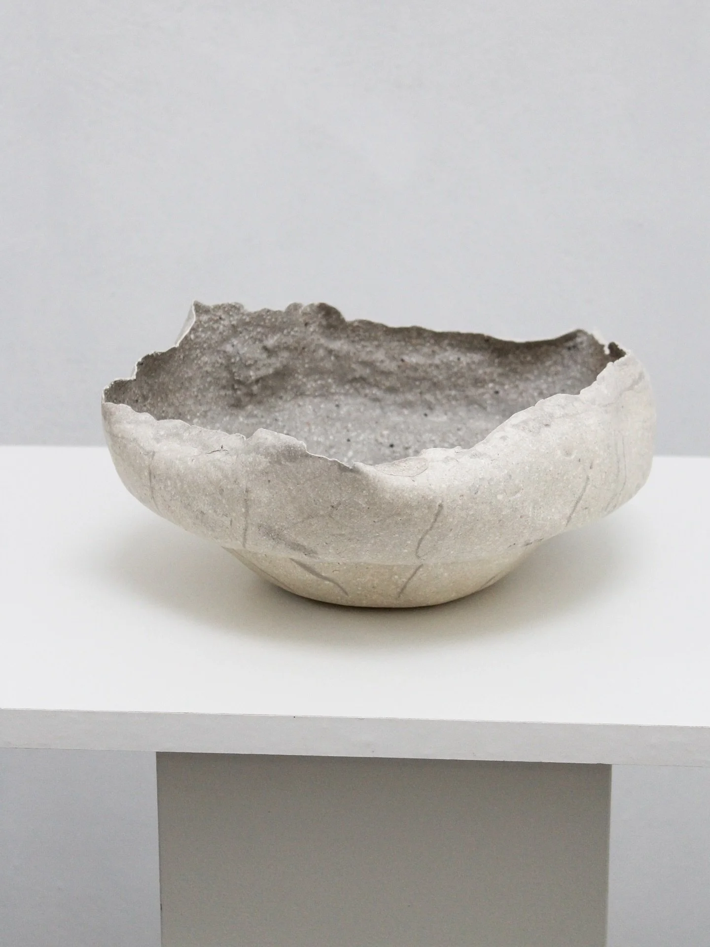 Eggshell Ceramic no.19 

Available at the New Store of Nieuwe Instituut Rotterdam. 

Made with approximately 100 discarded consumer eggshells. Diameter 29 cm - Height 12 cm 

Coloured with biochar, a regenerative black colourant. 

Long lasting indoo