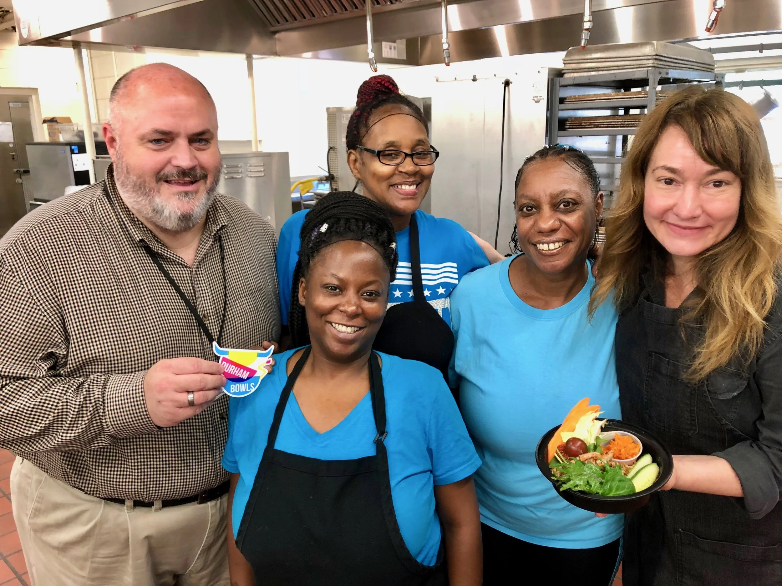 Team Black with nutrition staff from EK Powe Elementary School and the Big Dipper Bowl — chicken, carrot dip, and lots of local veggies