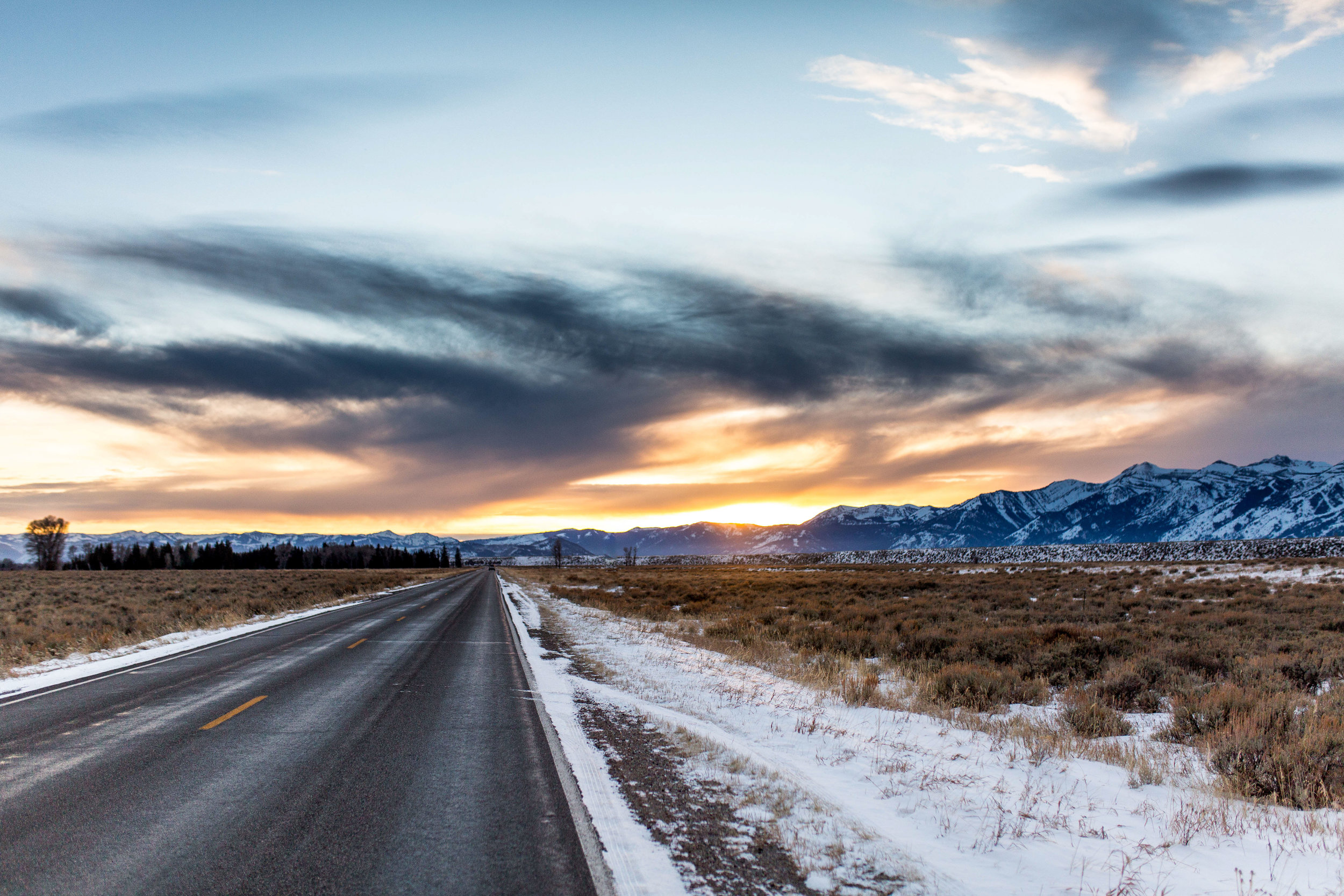 nicole-daacke-photography-jackson-hole-grand-teton-national-park-elopement-wedding-photographer-adventurous-engagement-session-grand-tetons-snow-visit-itinerary-for-jackson-hole-wyoming-0053.jpg