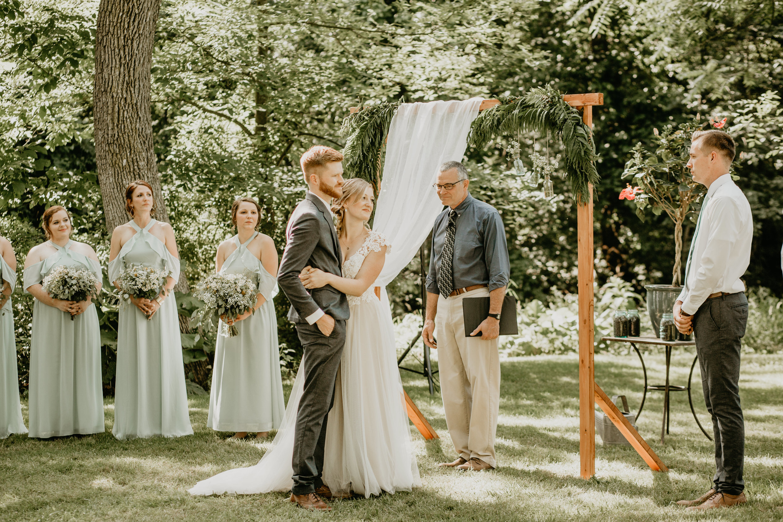 Nicole-Daacke-Photography-pennsylvania-laid-back-outside-backyard-wedding-family-summer-june-maryland-barefoot-bride-woodland-trees-sunset-couple-39.jpg