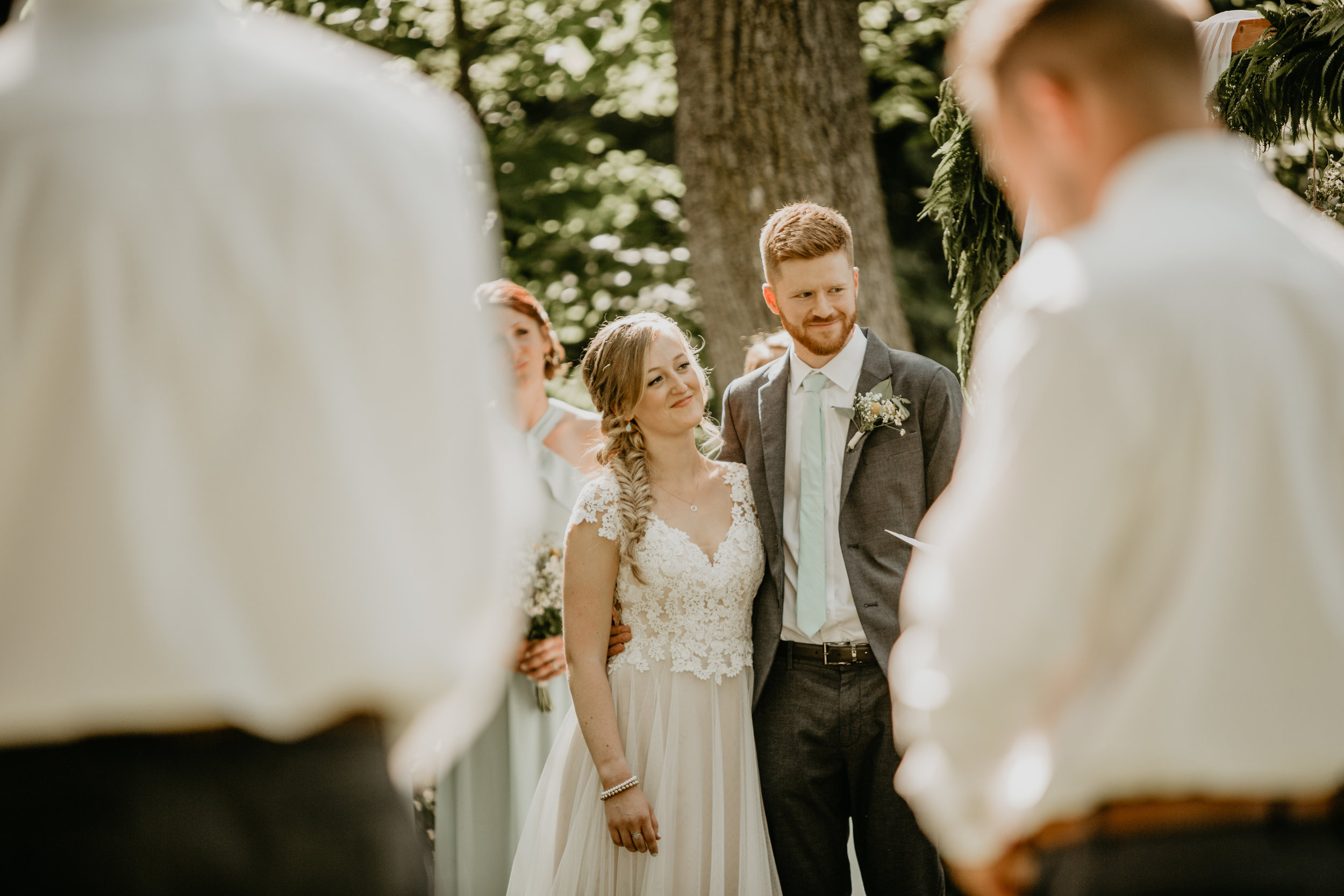 Nicole-Daacke-Photography-pennsylvania-laid-back-outside-backyard-wedding-family-summer-june-maryland-barefoot-bride-woodland-trees-sunset-couple-43.jpg