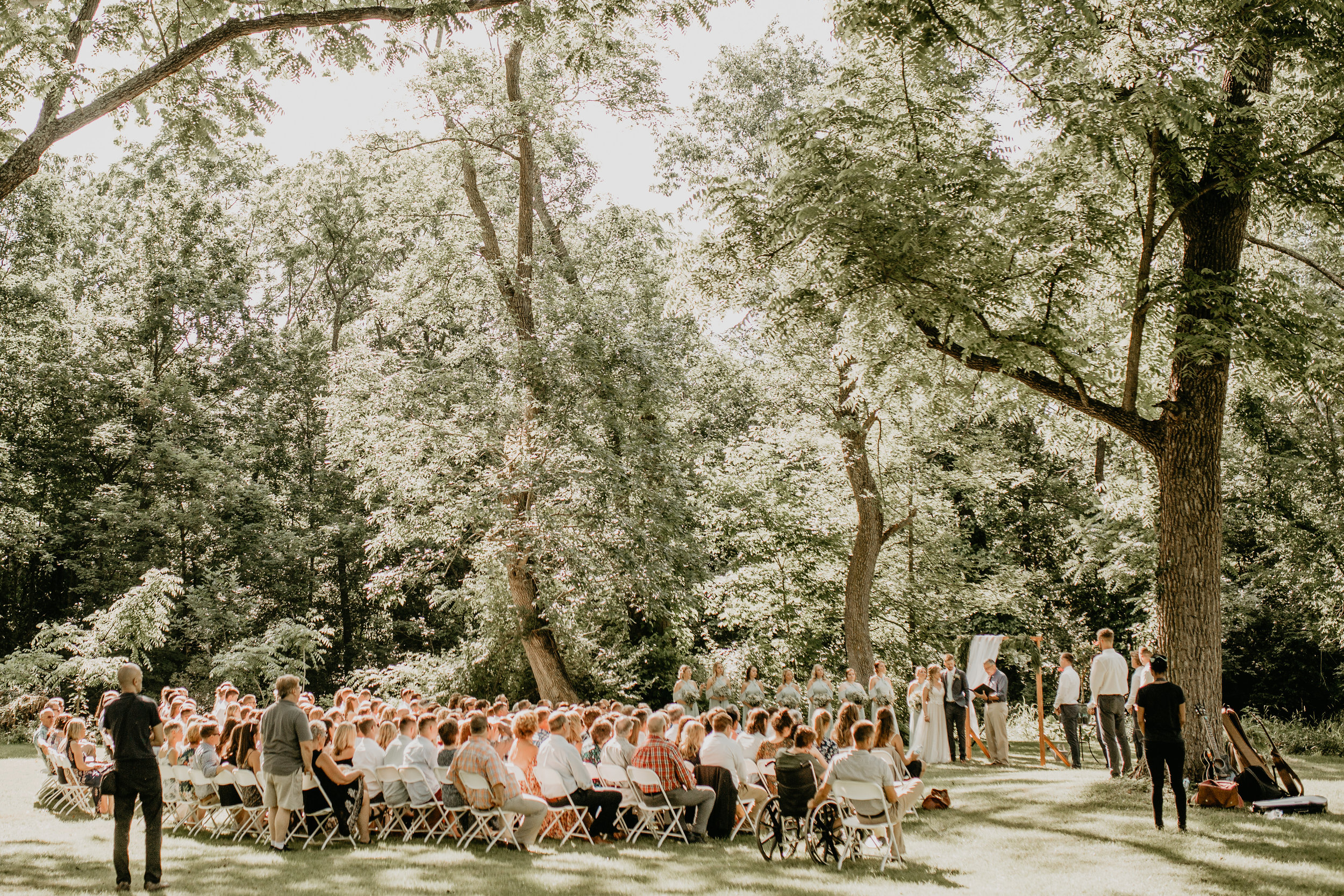 Nicole-Daacke-Photography-pennsylvania-laid-back-outside-backyard-wedding-family-summer-june-maryland-barefoot-bride-woodland-trees-sunset-couple-42.jpg