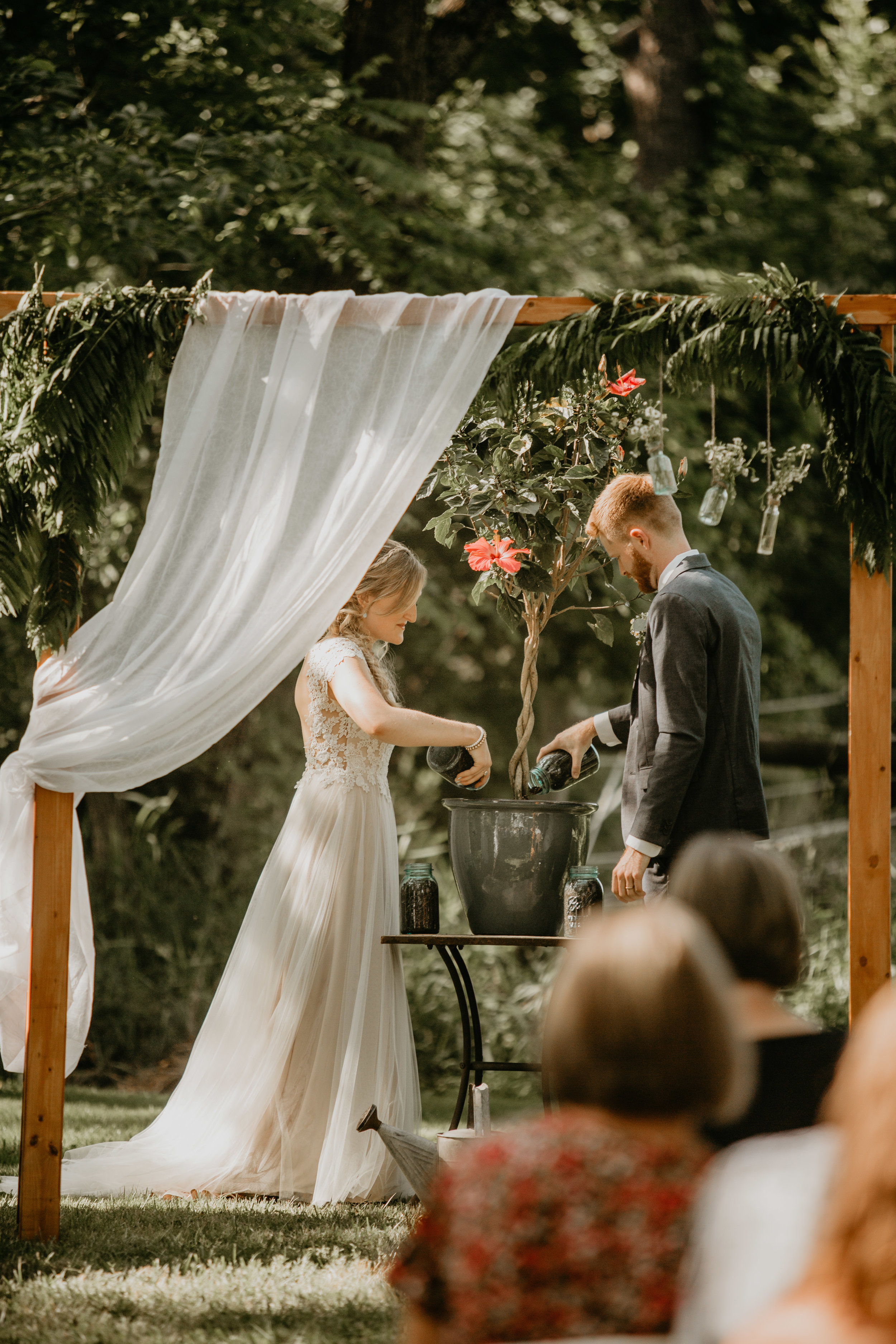 Nicole-Daacke-Photography-pennsylvania-laid-back-outside-backyard-wedding-family-summer-june-maryland-barefoot-bride-woodland-trees-sunset-couple-45.jpg