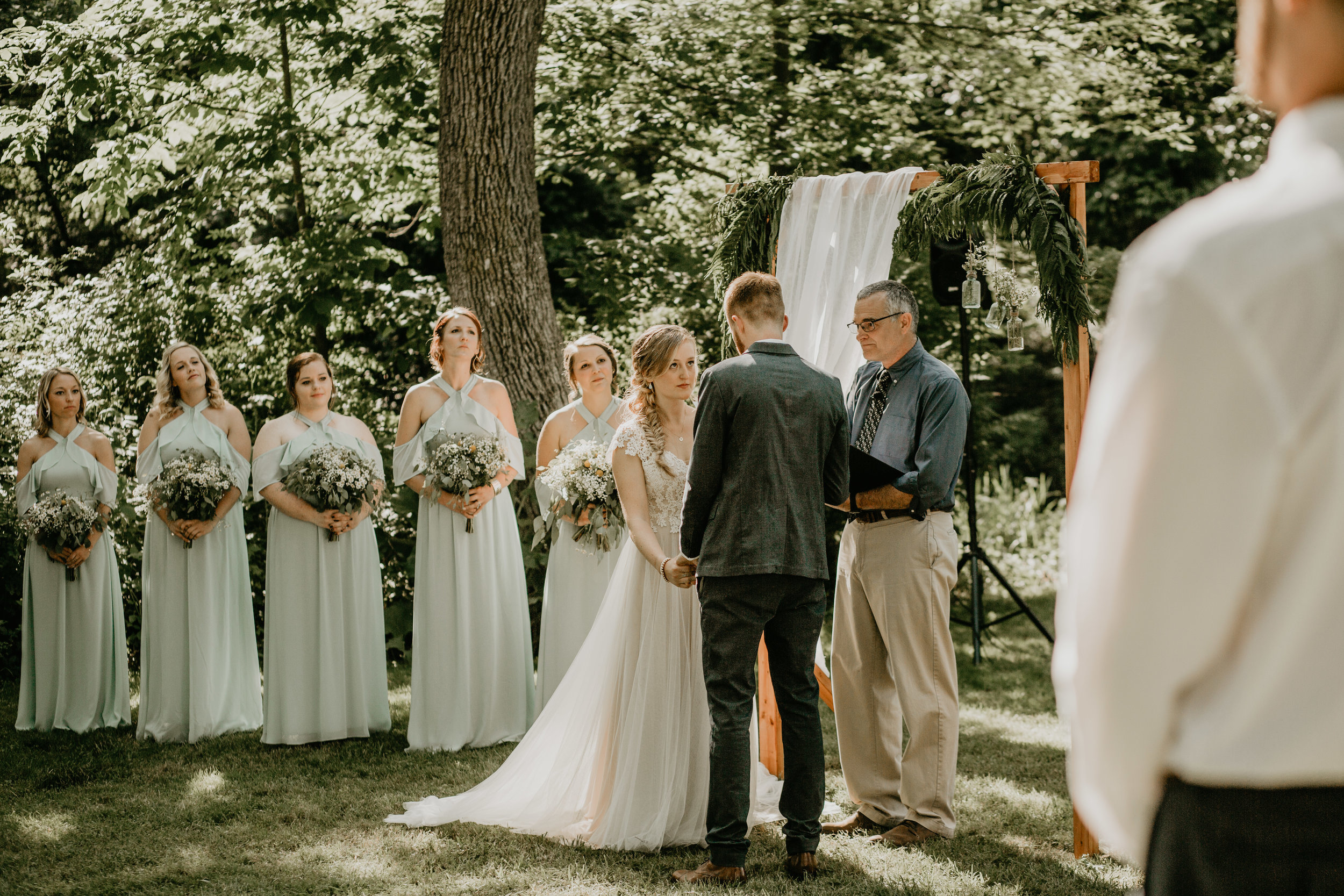 Nicole-Daacke-Photography-pennsylvania-laid-back-outside-backyard-wedding-family-summer-june-maryland-barefoot-bride-woodland-trees-sunset-couple-44.jpg