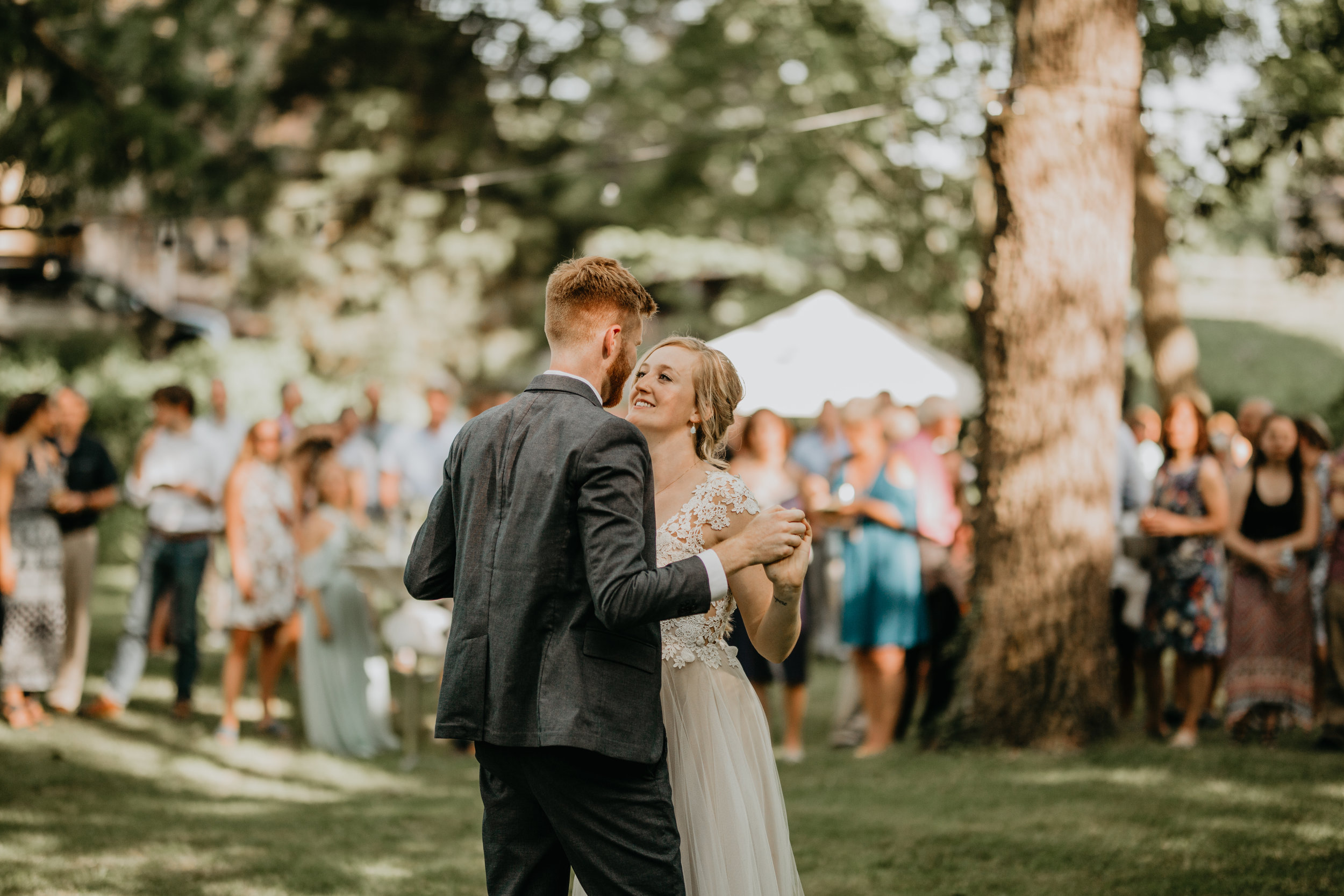 Nicole-Daacke-Photography-pennsylvania-laid-back-outside-backyard-wedding-family-summer-june-maryland-barefoot-bride-woodland-trees-sunset-couple-61.jpg