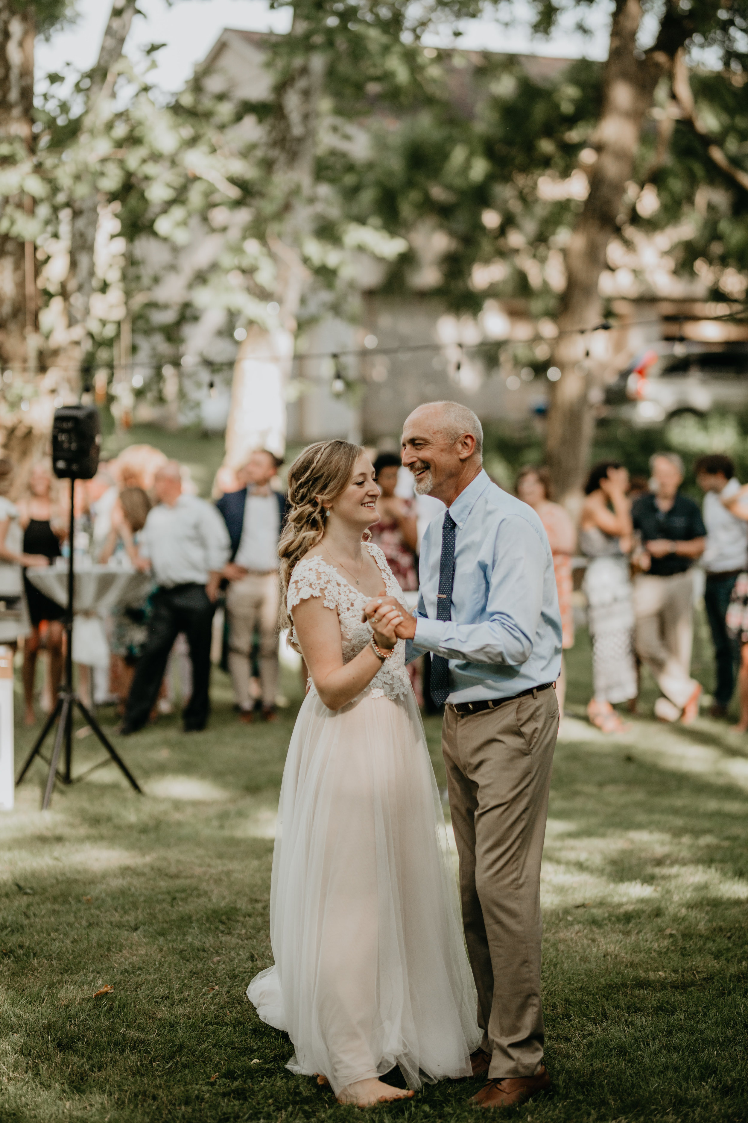 Nicole-Daacke-Photography-pennsylvania-laid-back-outside-backyard-wedding-family-summer-june-maryland-barefoot-bride-woodland-trees-sunset-couple-62.jpg