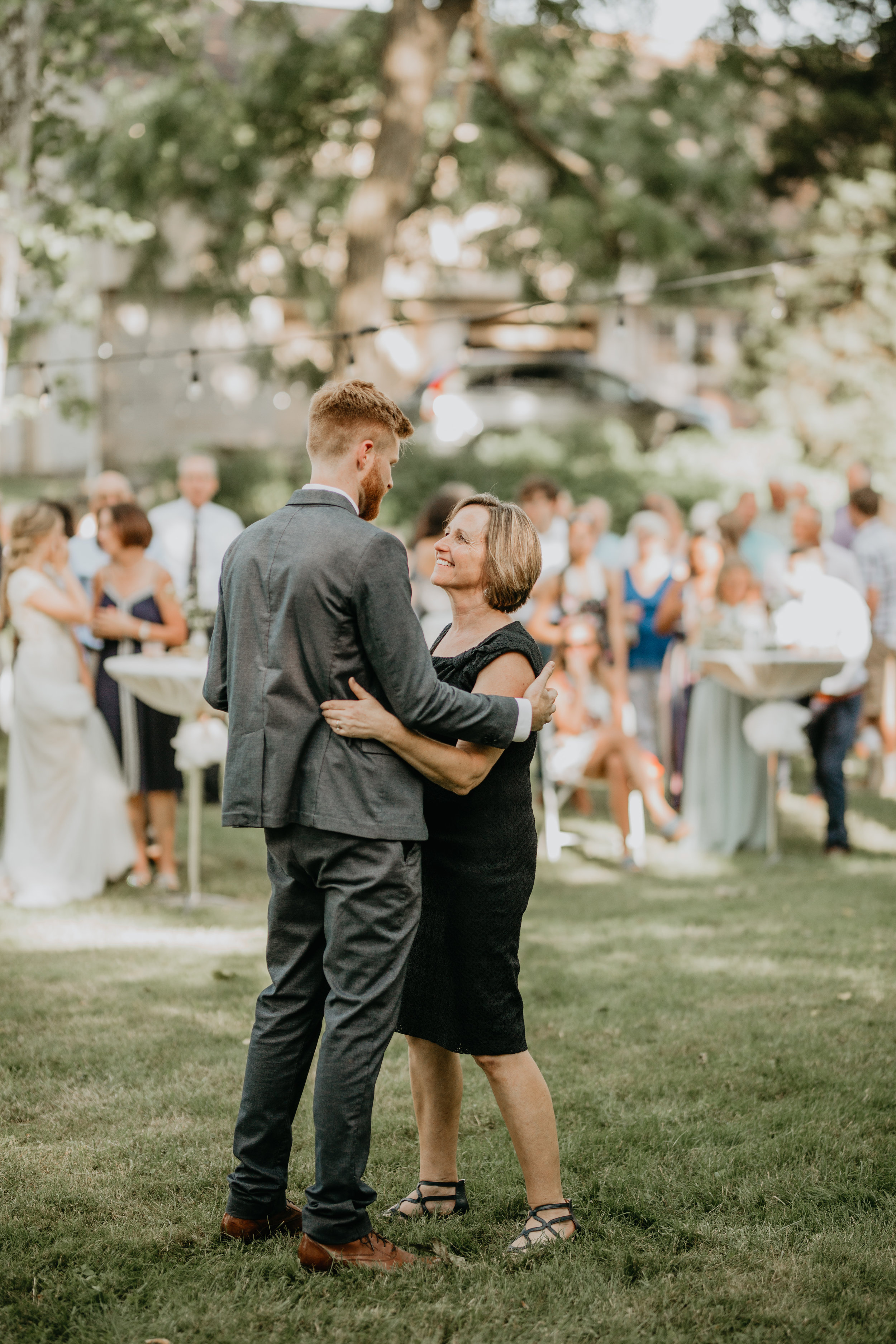 Nicole-Daacke-Photography-pennsylvania-laid-back-outside-backyard-wedding-family-summer-june-maryland-barefoot-bride-woodland-trees-sunset-couple-63.jpg