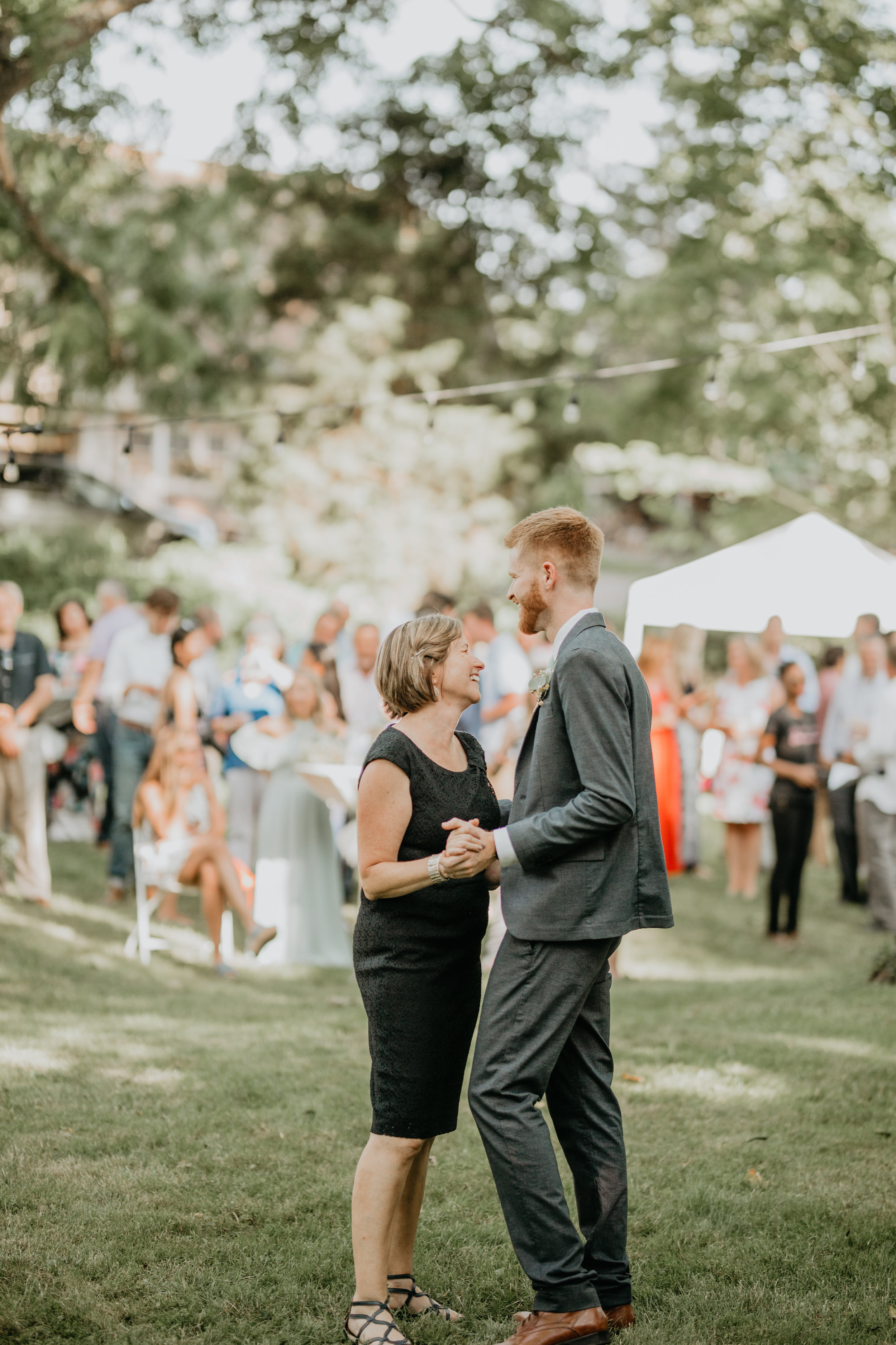 Nicole-Daacke-Photography-pennsylvania-laid-back-outside-backyard-wedding-family-summer-june-maryland-barefoot-bride-woodland-trees-sunset-couple-64.jpg