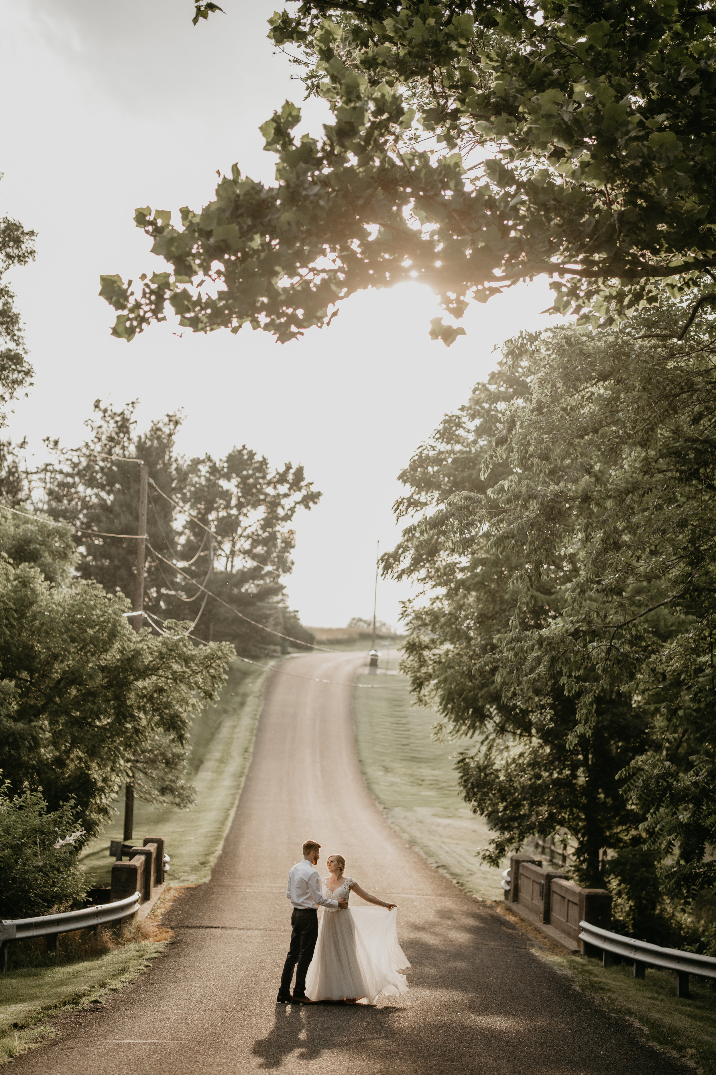 Nicole-Daacke-Photography-pennsylvania-laid-back-outside-backyard-wedding-family-summer-june-maryland-barefoot-bride-woodland-trees-sunset-couple-75.jpg