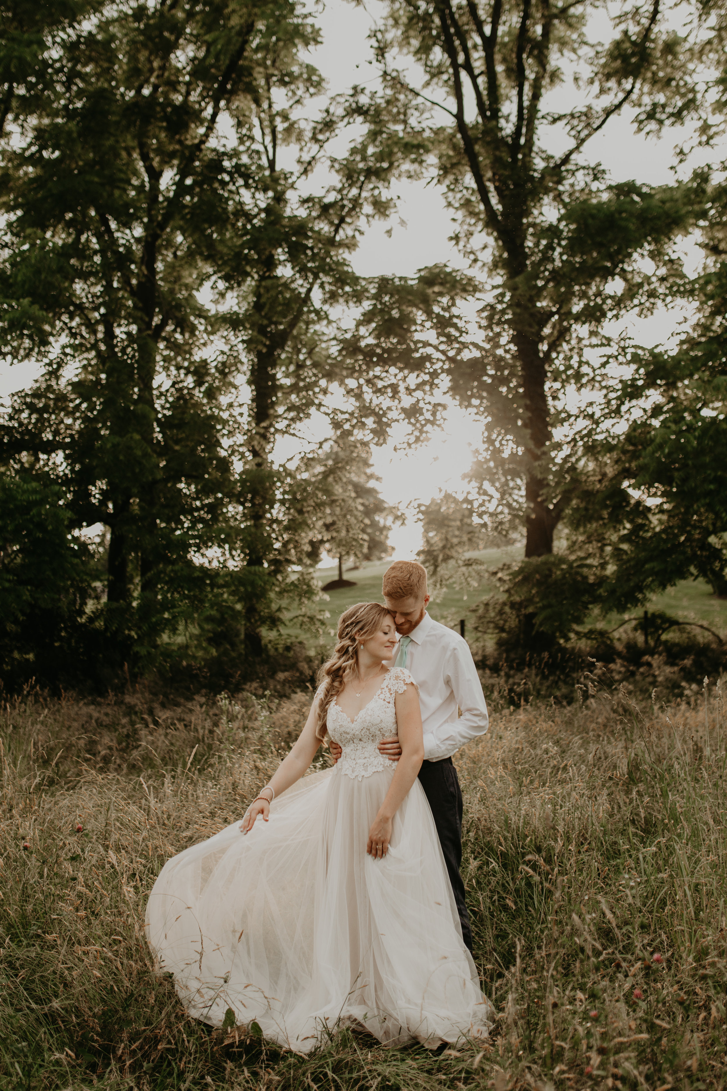 Nicole-Daacke-Photography-pennsylvania-laid-back-outside-backyard-wedding-family-summer-june-maryland-barefoot-bride-woodland-trees-sunset-couple-79.jpg
