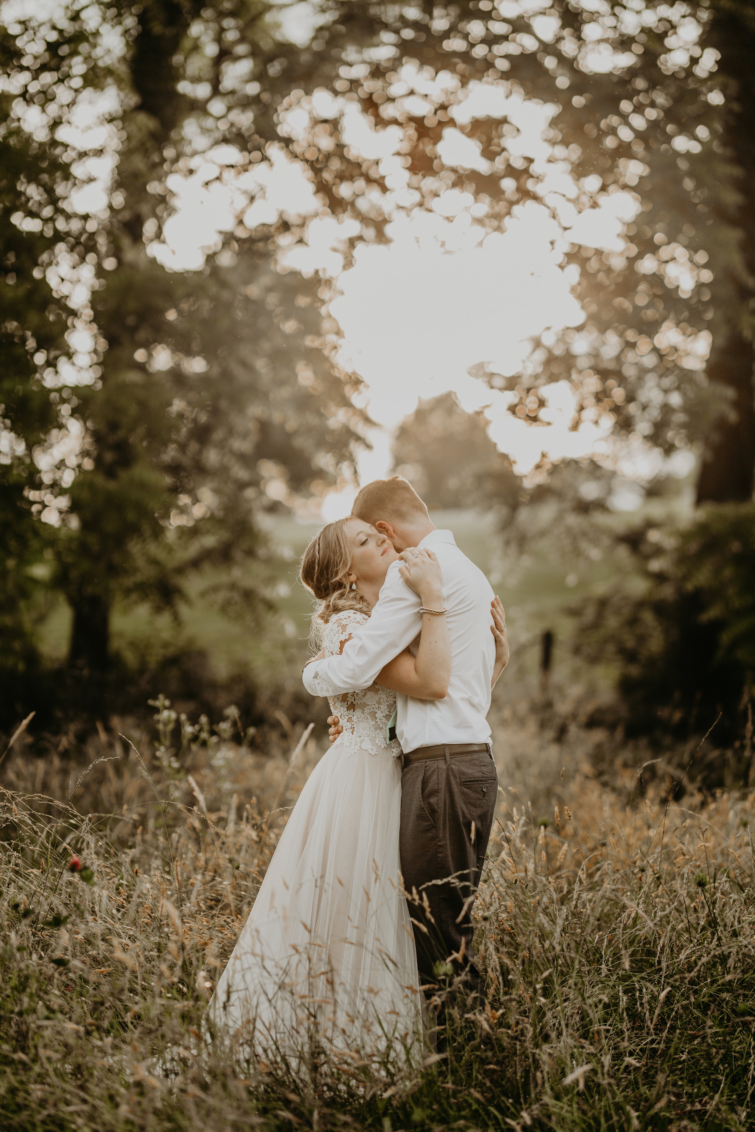 Nicole-Daacke-Photography-pennsylvania-laid-back-outside-backyard-wedding-family-summer-june-maryland-barefoot-bride-woodland-trees-sunset-couple-78.jpg