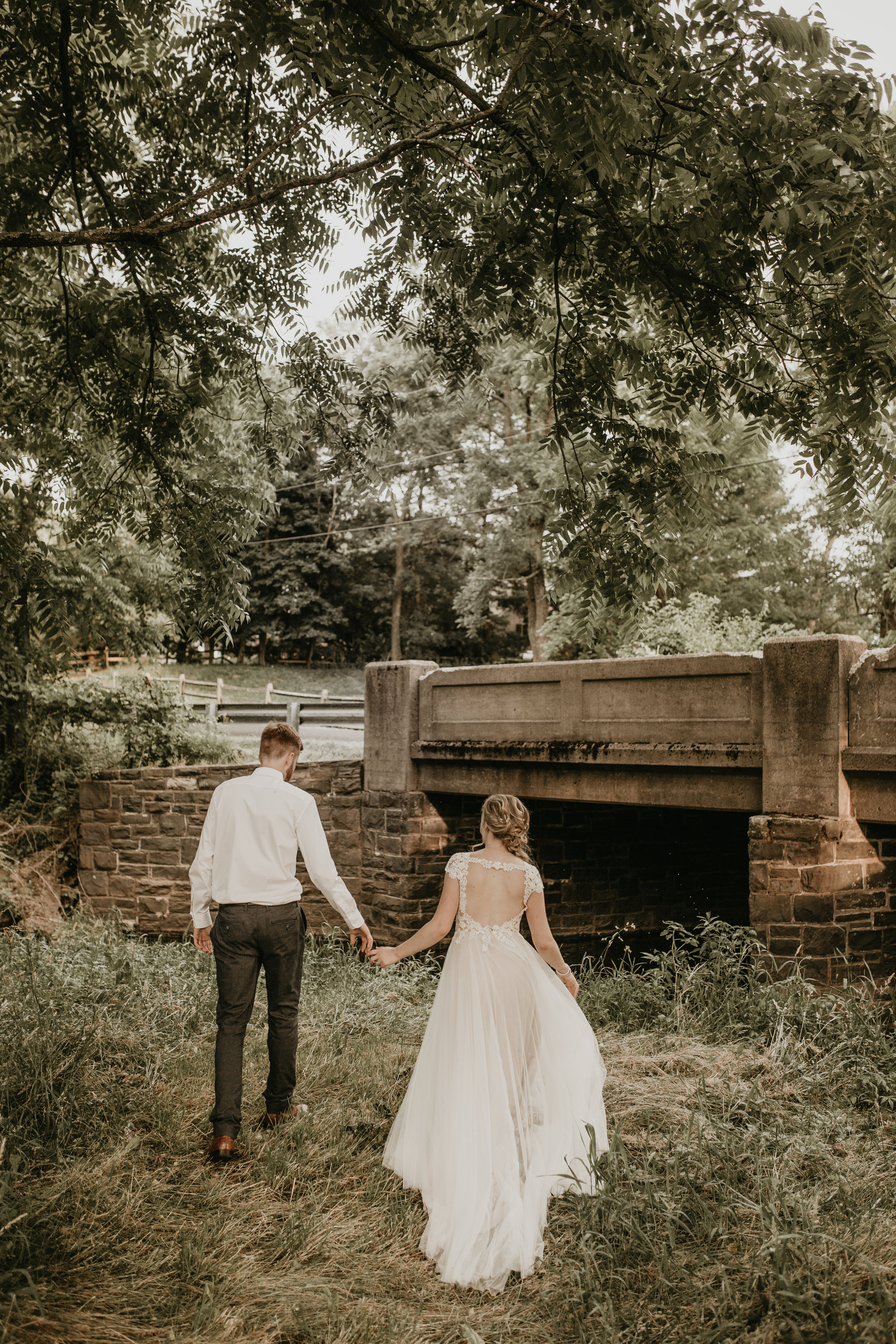 Nicole-Daacke-Photography-pennsylvania-laid-back-outside-backyard-wedding-family-summer-june-maryland-barefoot-bride-woodland-trees-sunset-couple-83.jpg