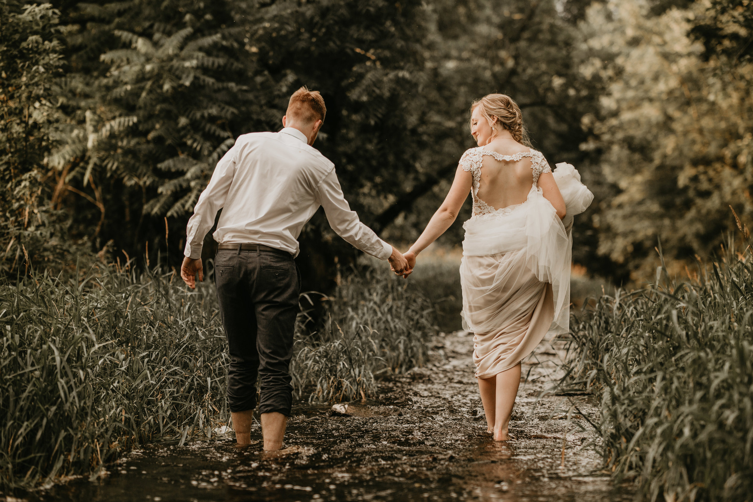 Nicole-Daacke-Photography-pennsylvania-laid-back-outside-backyard-wedding-family-summer-june-maryland-barefoot-bride-woodland-trees-sunset-couple-86.jpg