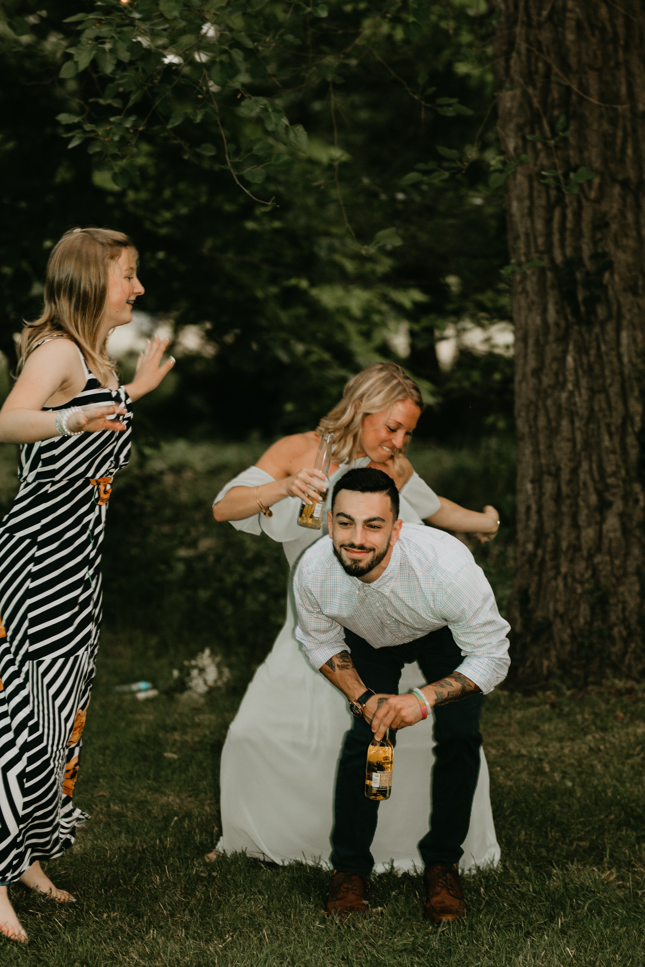 Nicole-Daacke-Photography-pennsylvania-laid-back-outside-backyard-wedding-family-summer-june-maryland-barefoot-bride-woodland-trees-sunset-couple-94.jpg