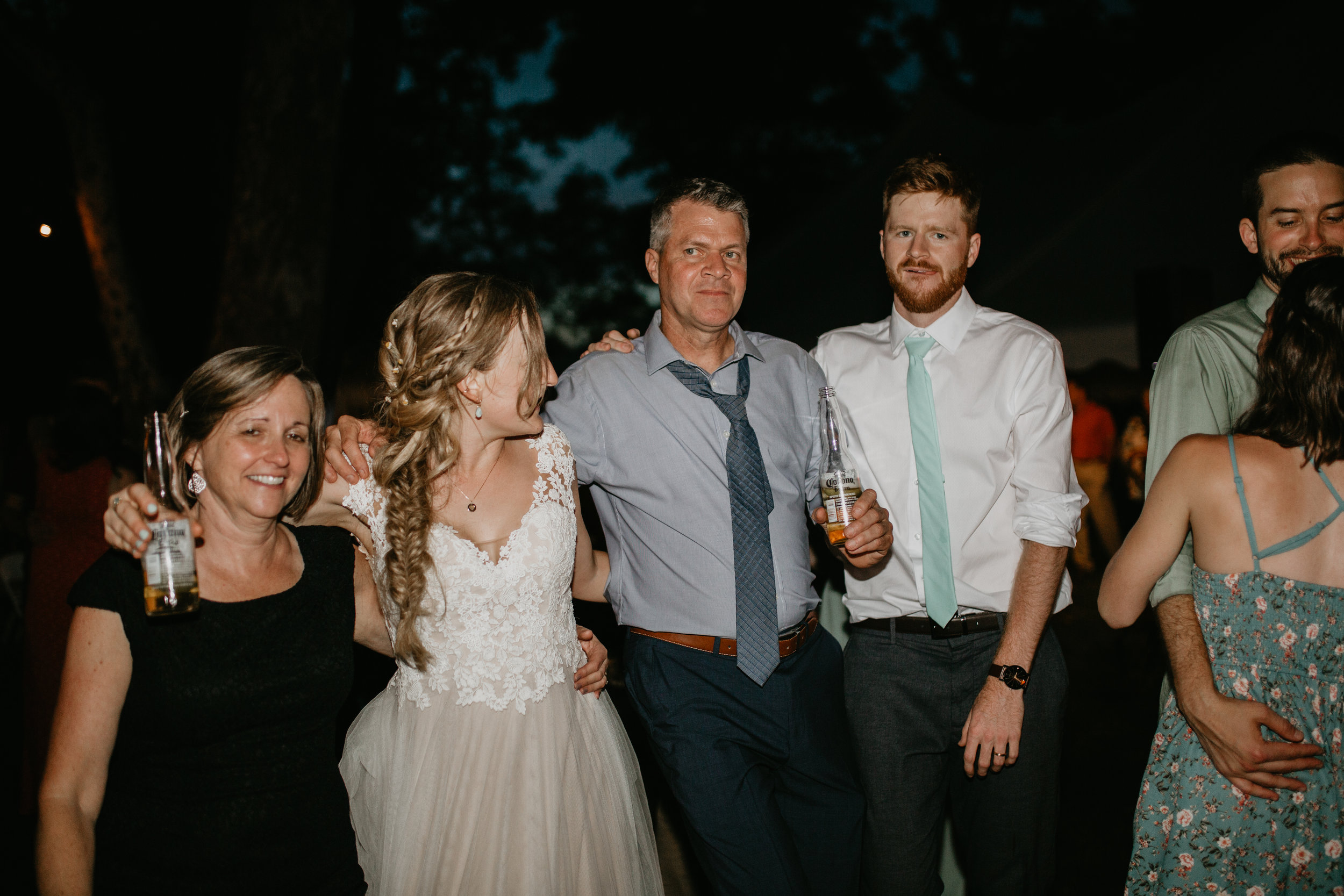 Nicole-Daacke-Photography-pennsylvania-laid-back-outside-backyard-wedding-family-summer-june-maryland-barefoot-bride-woodland-trees-sunset-couple-107.jpg