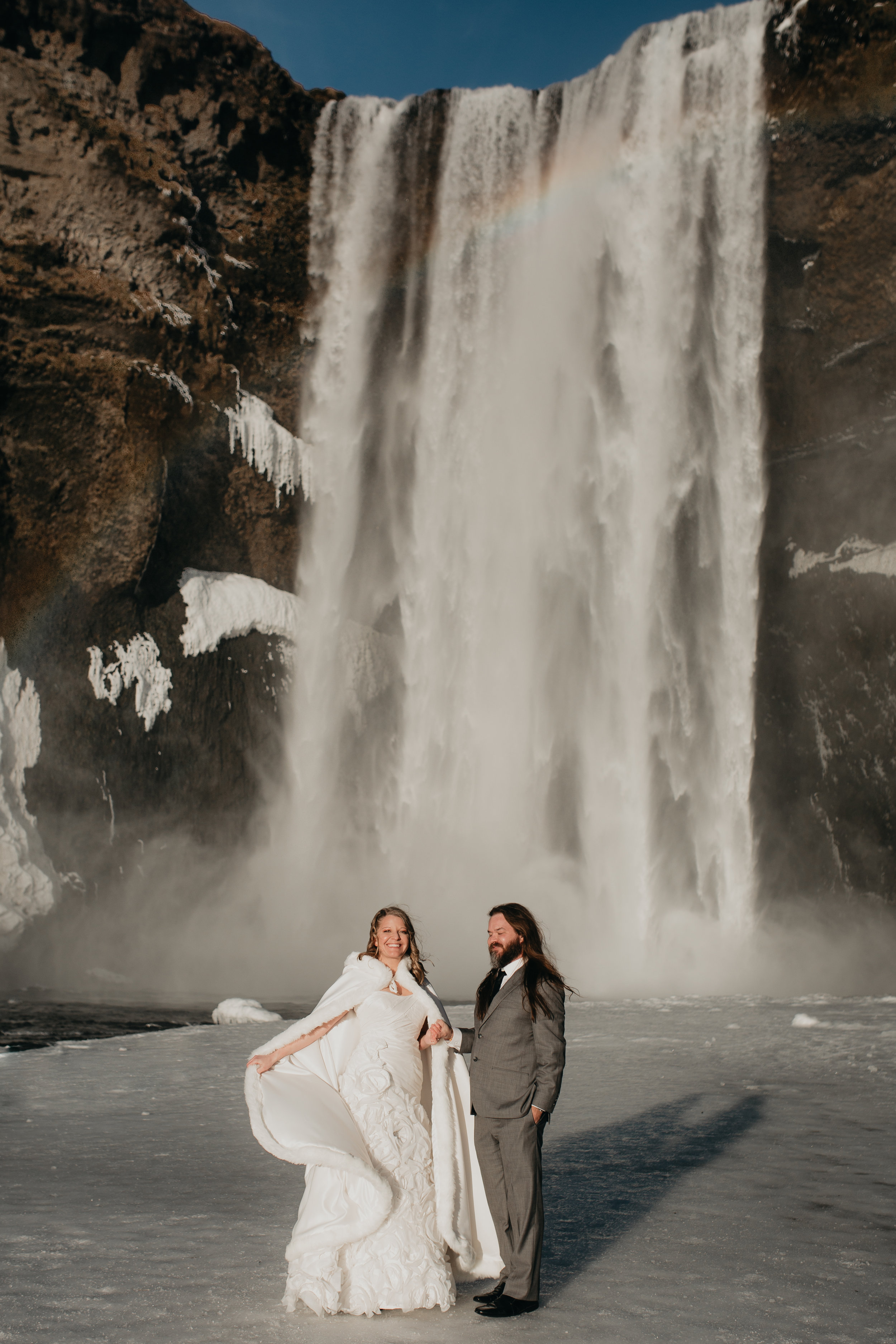 nicole-daacke-photography-iceland-winter-sunset-adventure-elopement-skogafoss-waterfall-black-sand-beach-dyrholaey-vik-iceland-intimate-wedding-black-church-elopement-photographer-8.jpg
