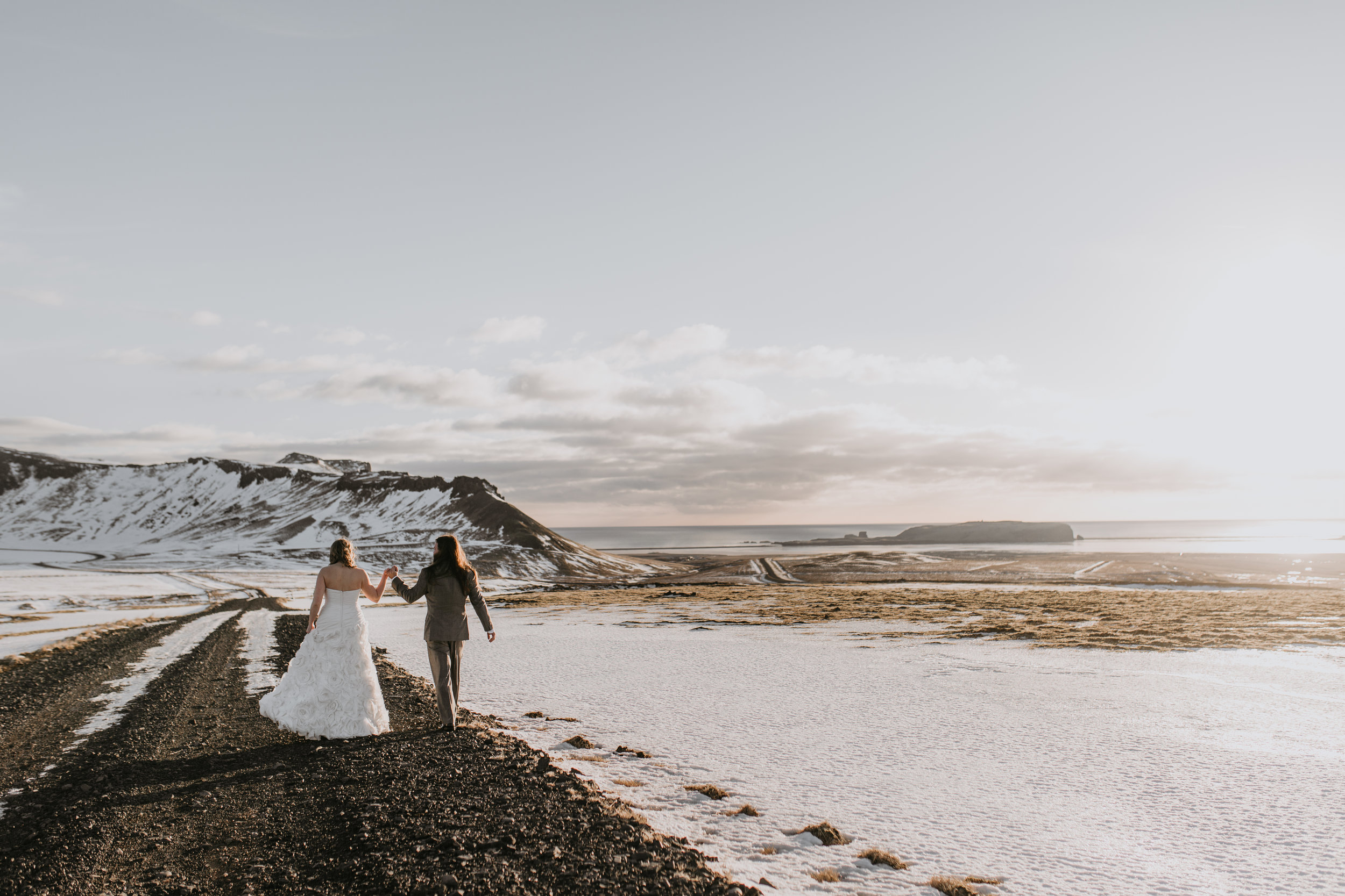 nicole-daacke-photography-iceland-winter-sunset-adventure-elopement-skogafoss-waterfall-black-sand-beach-dyrholaey-vik-iceland-intimate-wedding-black-church-elopement-photographer-14.jpg