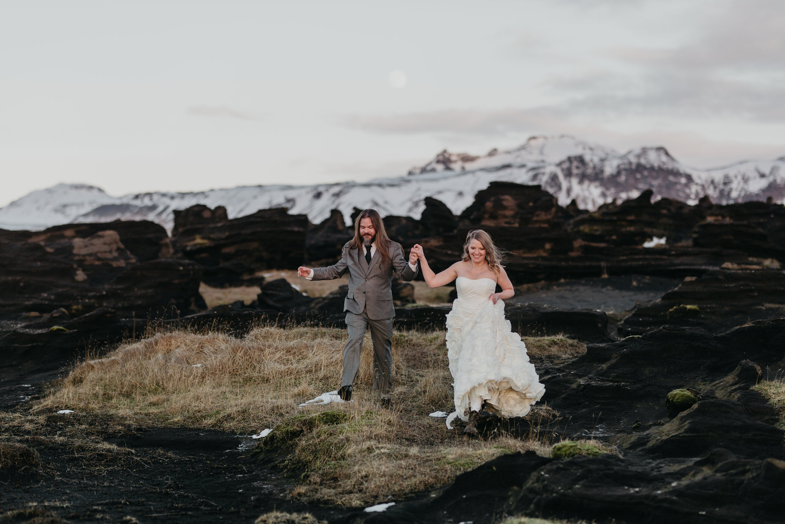 nicole-daacke-photography-iceland-winter-sunset-adventure-elopement-skogafoss-waterfall-black-sand-beach-dyrholaey-vik-iceland-intimate-wedding-black-church-elopement-photographer-27.jpg