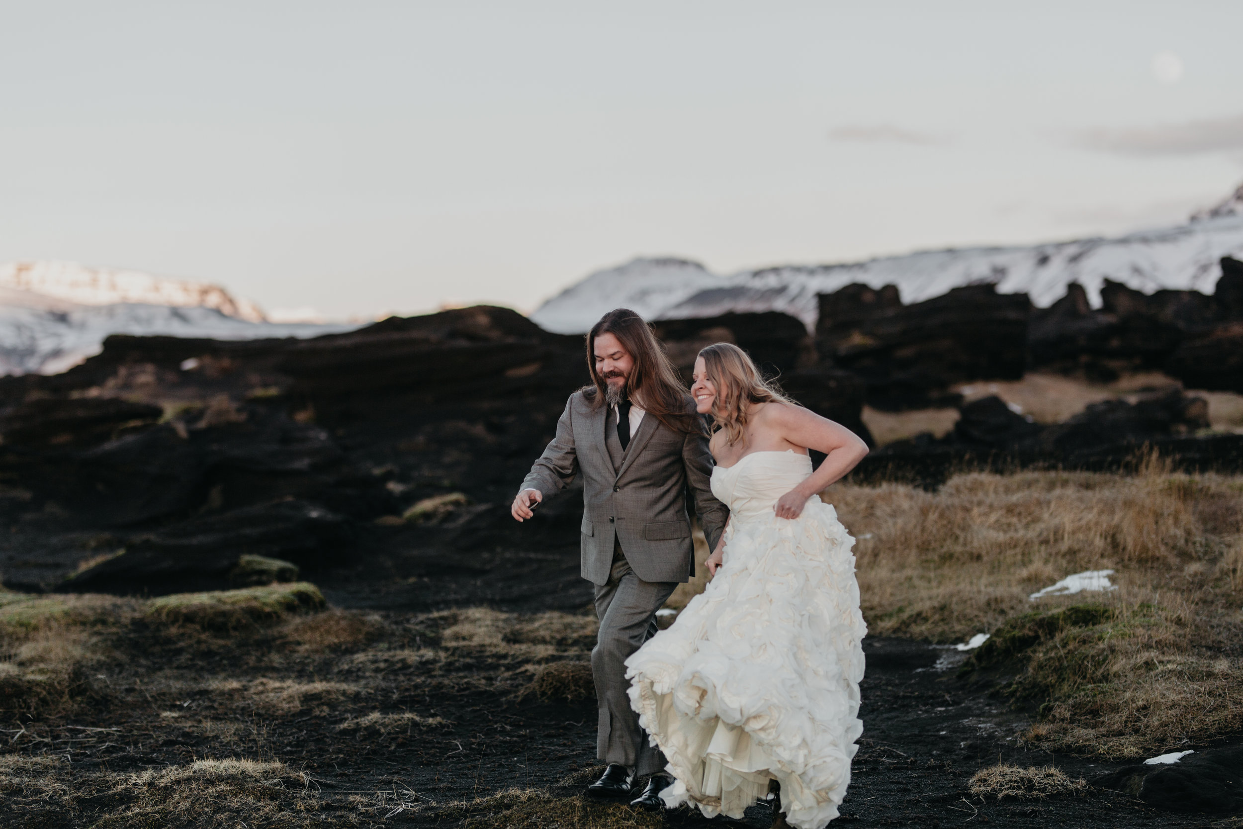 nicole-daacke-photography-iceland-winter-sunset-adventure-elopement-skogafoss-waterfall-black-sand-beach-dyrholaey-vik-iceland-intimate-wedding-black-church-elopement-photographer-28.jpg