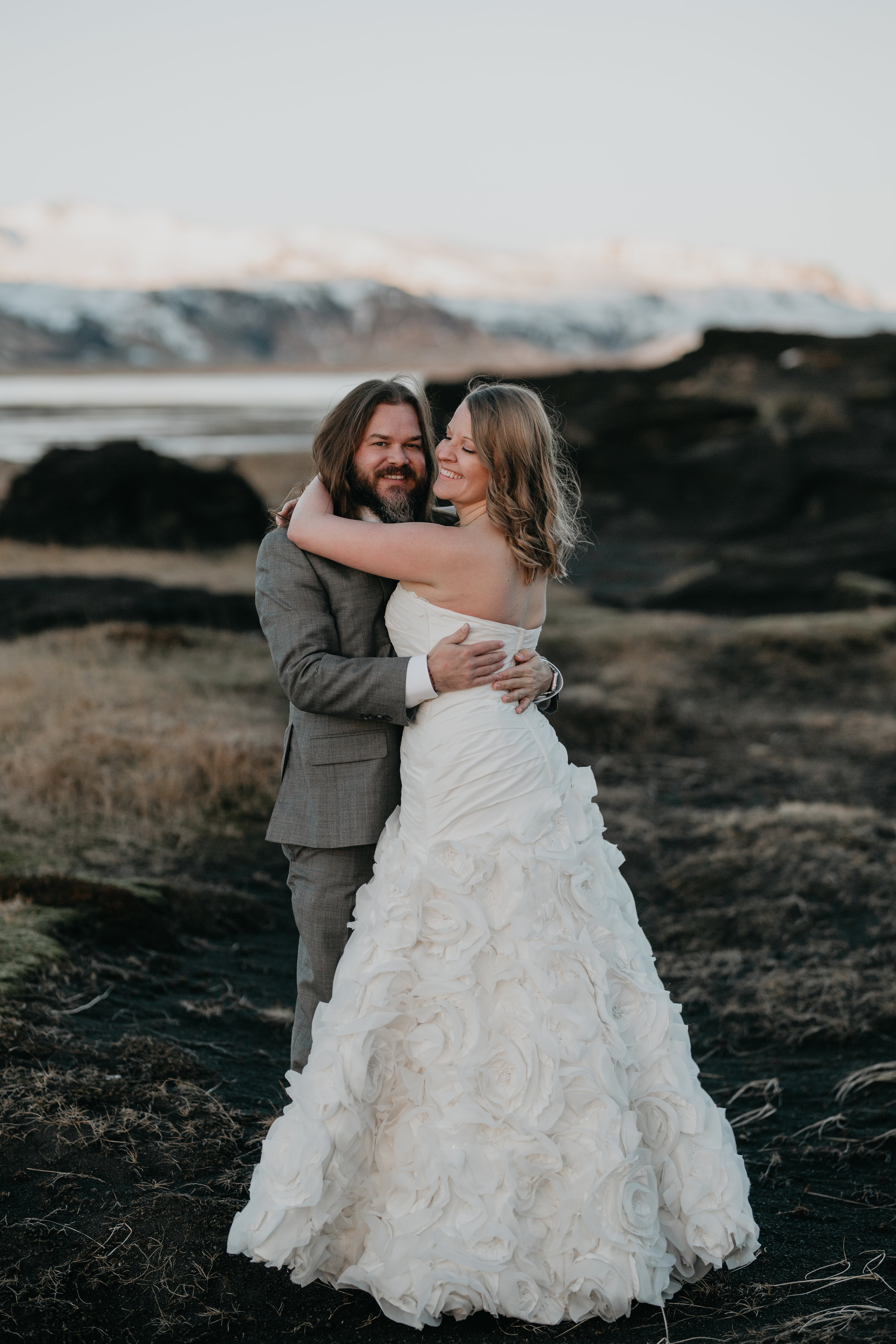 nicole-daacke-photography-iceland-winter-sunset-adventure-elopement-skogafoss-waterfall-black-sand-beach-dyrholaey-vik-iceland-intimate-wedding-black-church-elopement-photographer-30.jpg