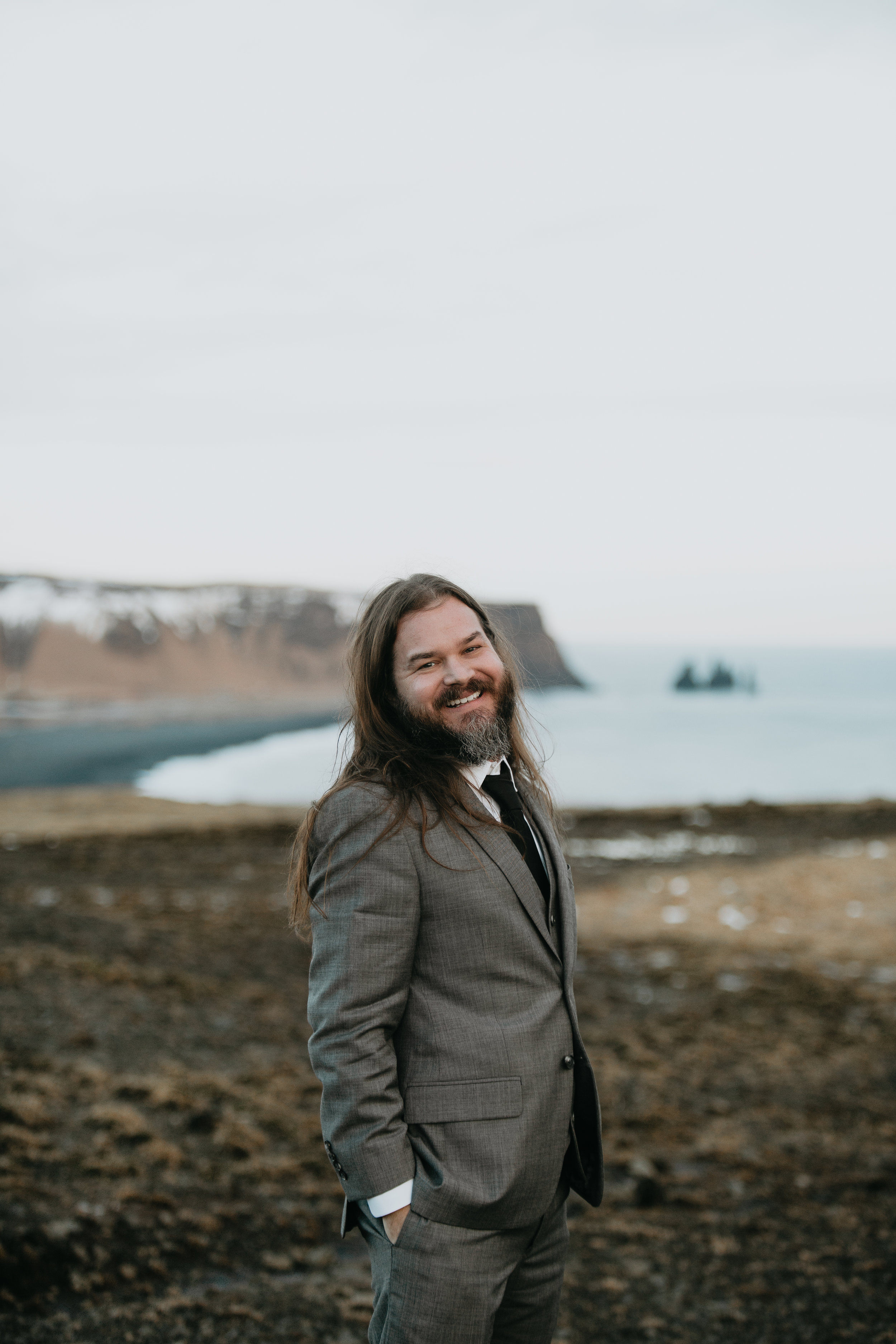 nicole-daacke-photography-iceland-winter-sunset-adventure-elopement-skogafoss-waterfall-black-sand-beach-dyrholaey-vik-iceland-intimate-wedding-black-church-elopement-photographer-32.jpg