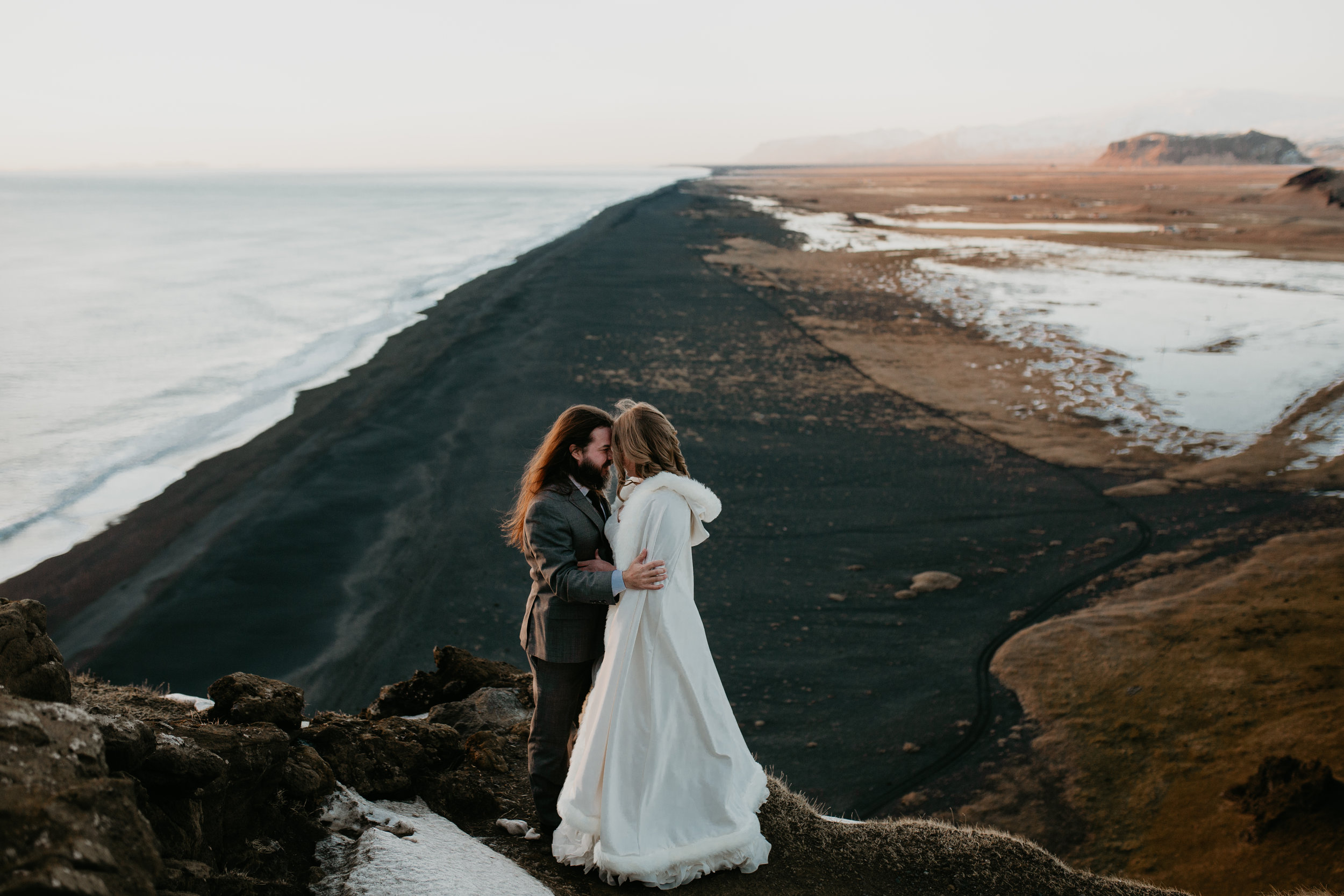 nicole-daacke-photography-iceland-winter-sunset-adventure-elopement-skogafoss-waterfall-black-sand-beach-dyrholaey-vik-iceland-intimate-wedding-black-church-elopement-photographer-40.jpg