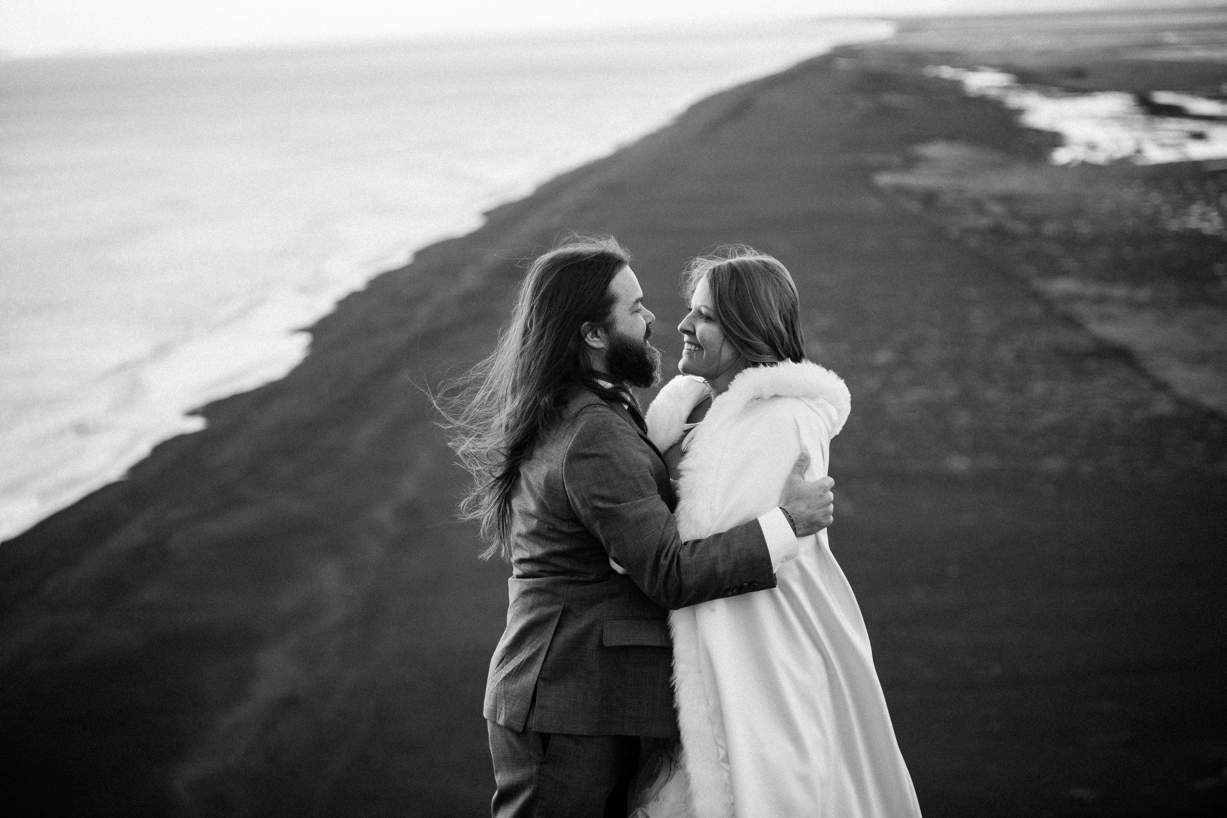 nicole-daacke-photography-iceland-winter-sunset-adventure-elopement-skogafoss-waterfall-black-sand-beach-dyrholaey-vik-iceland-intimate-wedding-black-church-elopement-photographer-39.jpg