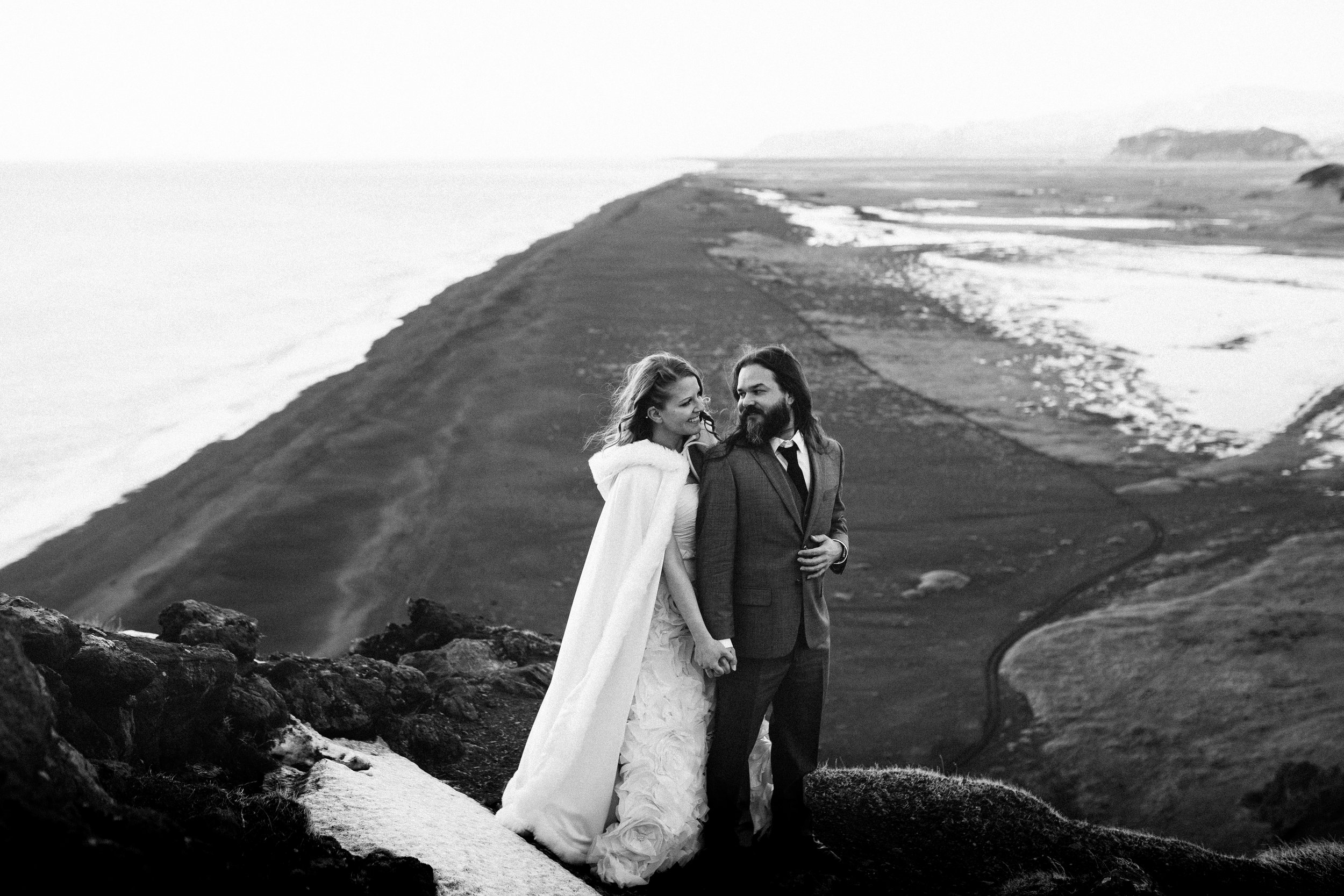 nicole-daacke-photography-iceland-winter-sunset-adventure-elopement-skogafoss-waterfall-black-sand-beach-dyrholaey-vik-iceland-intimate-wedding-black-church-elopement-photographer-41.jpg