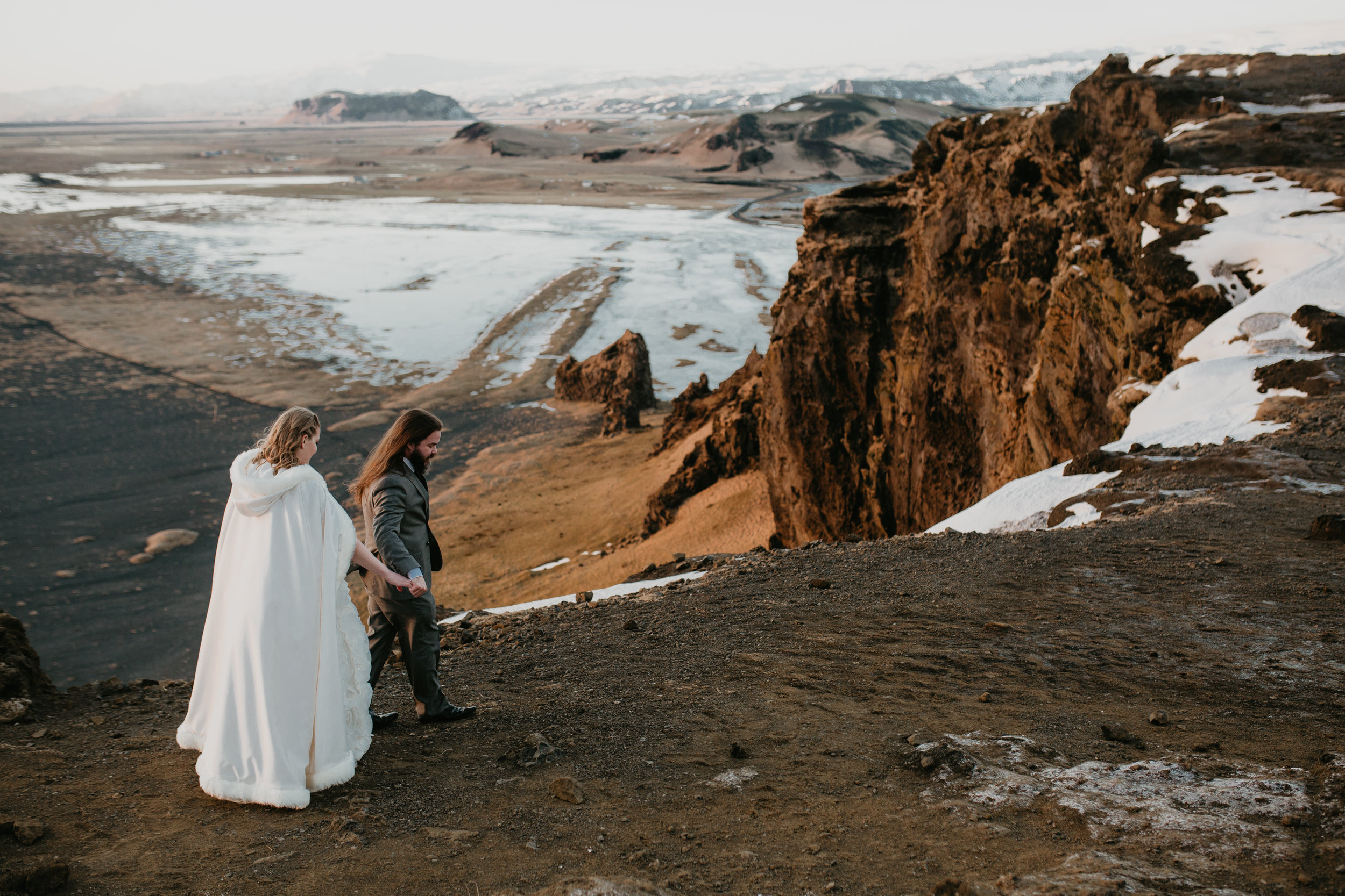 nicole-daacke-photography-iceland-winter-sunset-adventure-elopement-skogafoss-waterfall-black-sand-beach-dyrholaey-vik-iceland-intimate-wedding-black-church-elopement-photographer-44.jpg