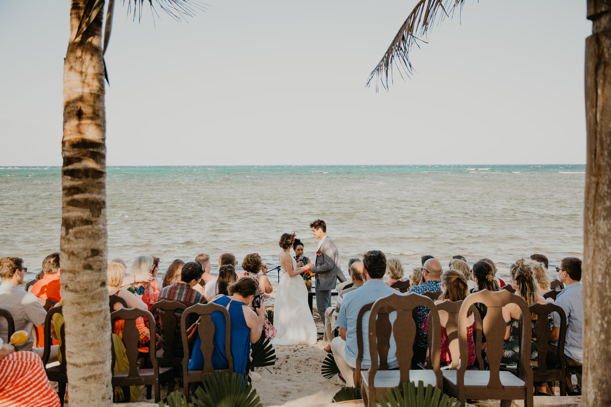 Nicole-Daacke-Photography-beachfront-akumal-destionation-wedding-tulum-mexico-elopement-photographer-destination-wedding-inspiration-sunset-champagne-pop-boho-bride-ocean-tropical-bohemian-tulum-wedding-photos-167.jpg