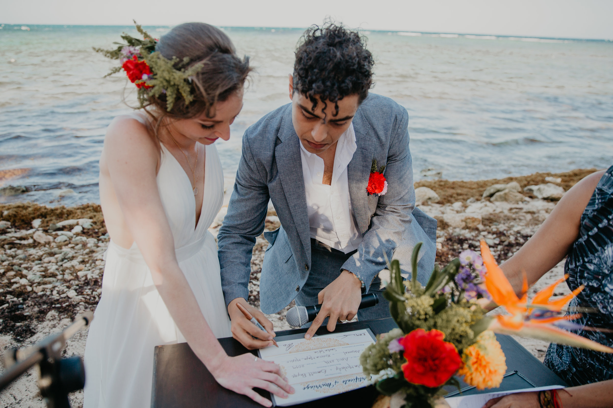 Nicole-Daacke-Photography-beachfront-akumal-destionation-wedding-tulum-mexico-elopement-photographer-destination-wedding-inspiration-sunset-champagne-pop-boho-bride-ocean-tropical-bohemian-tulum-wedding-photos-172.jpg