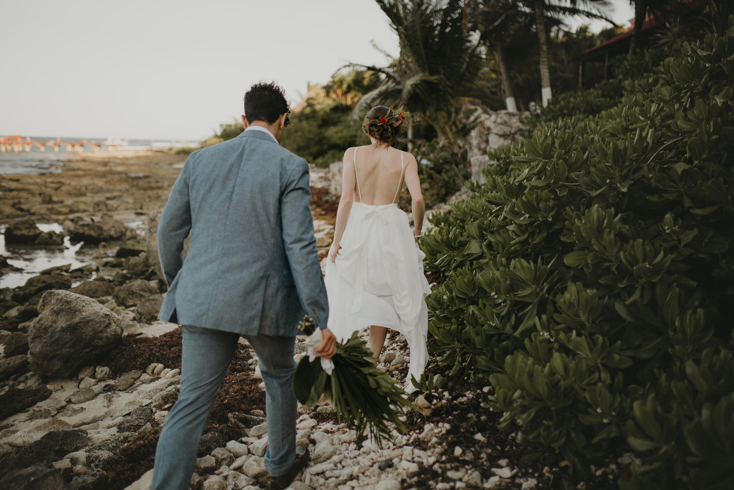 Nicole-Daacke-Photography-beachfront-akumal-destionation-wedding-tulum-mexico-elopement-photographer-destination-wedding-inspiration-sunset-champagne-pop-boho-bride-ocean-tropical-bohemian-tulum-wedding-photos-179.jpg