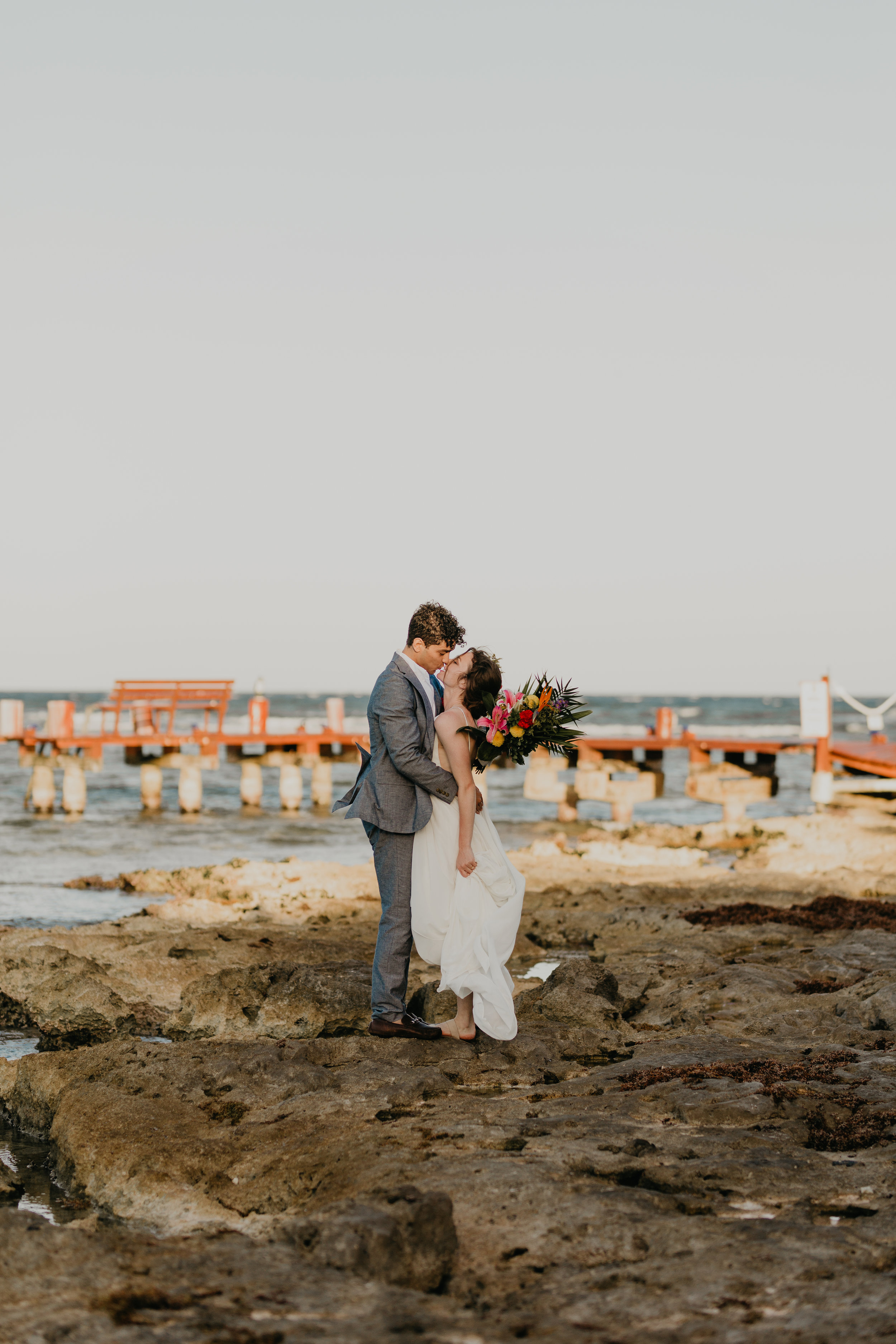 Nicole-Daacke-Photography-beachfront-akumal-destionation-wedding-tulum-mexico-elopement-photographer-destination-wedding-inspiration-sunset-champagne-pop-boho-bride-ocean-tropical-bohemian-tulum-wedding-photos-181.jpg