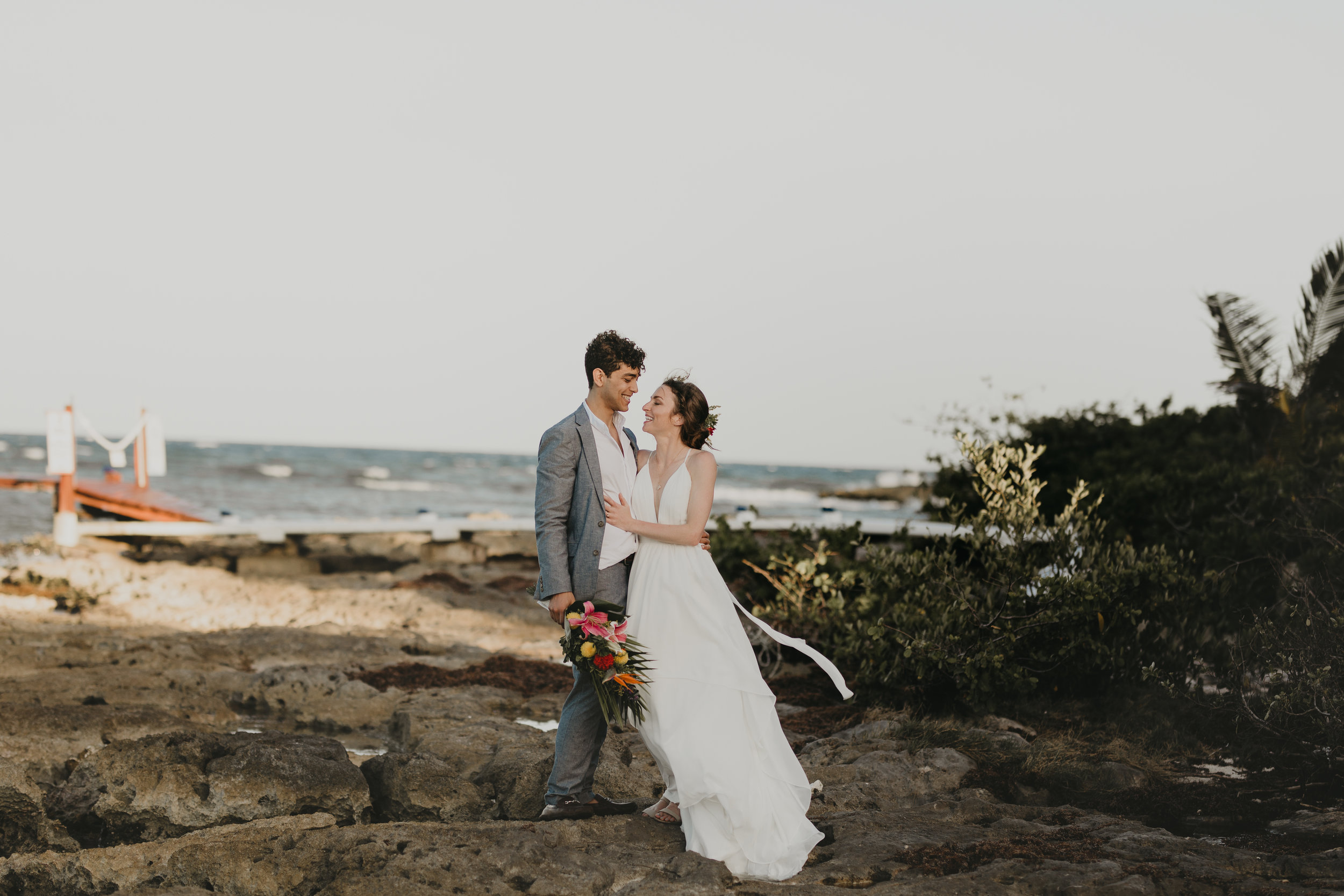 Nicole-Daacke-Photography-beachfront-akumal-destionation-wedding-tulum-mexico-elopement-photographer-destination-wedding-inspiration-sunset-champagne-pop-boho-bride-ocean-tropical-bohemian-tulum-wedding-photos-182.jpg