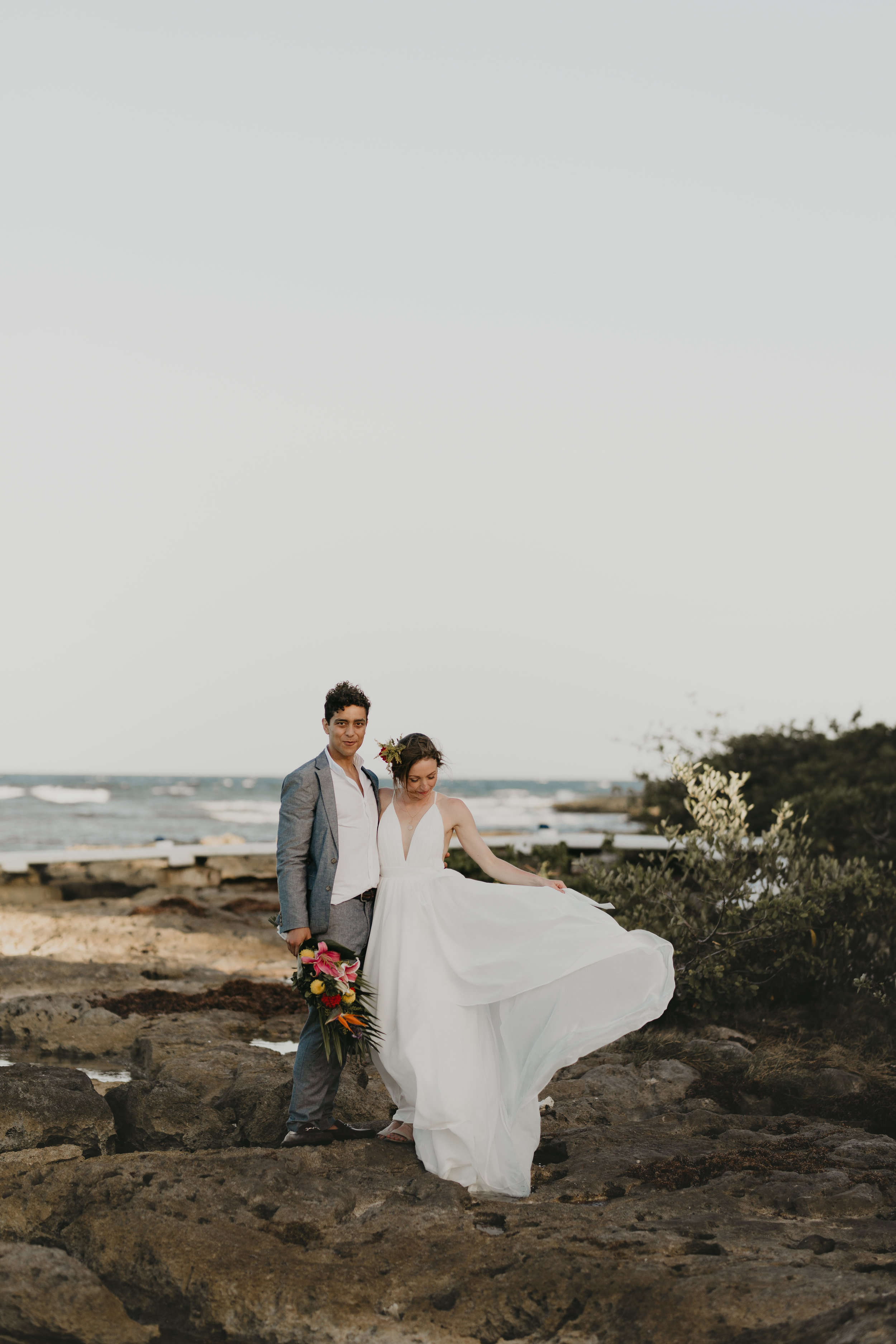 Nicole-Daacke-Photography-beachfront-akumal-destionation-wedding-tulum-mexico-elopement-photographer-destination-wedding-inspiration-sunset-champagne-pop-boho-bride-ocean-tropical-bohemian-tulum-wedding-photos-184.jpg