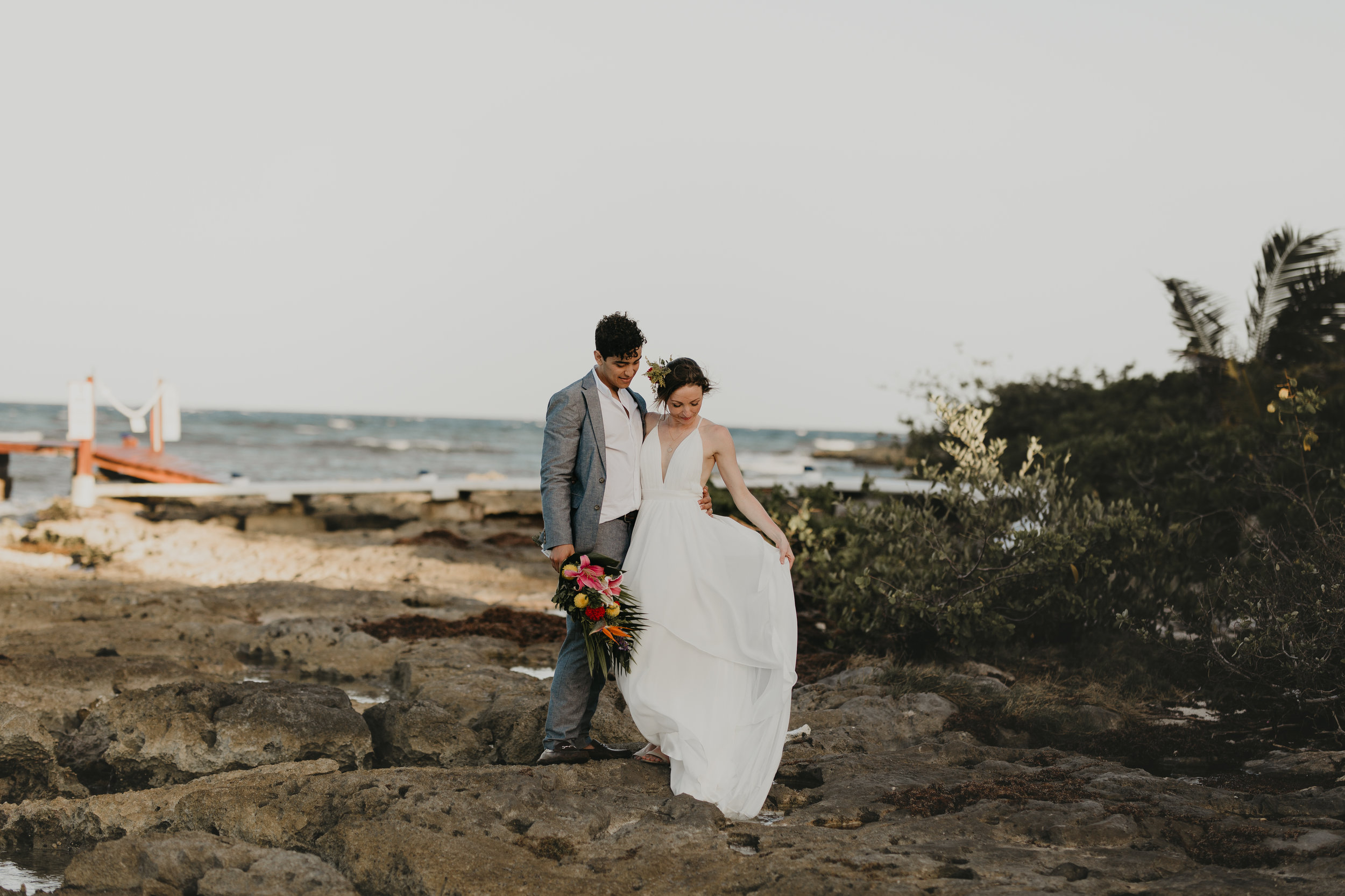 Nicole-Daacke-Photography-beachfront-akumal-destionation-wedding-tulum-mexico-elopement-photographer-destination-wedding-inspiration-sunset-champagne-pop-boho-bride-ocean-tropical-bohemian-tulum-wedding-photos-183.jpg