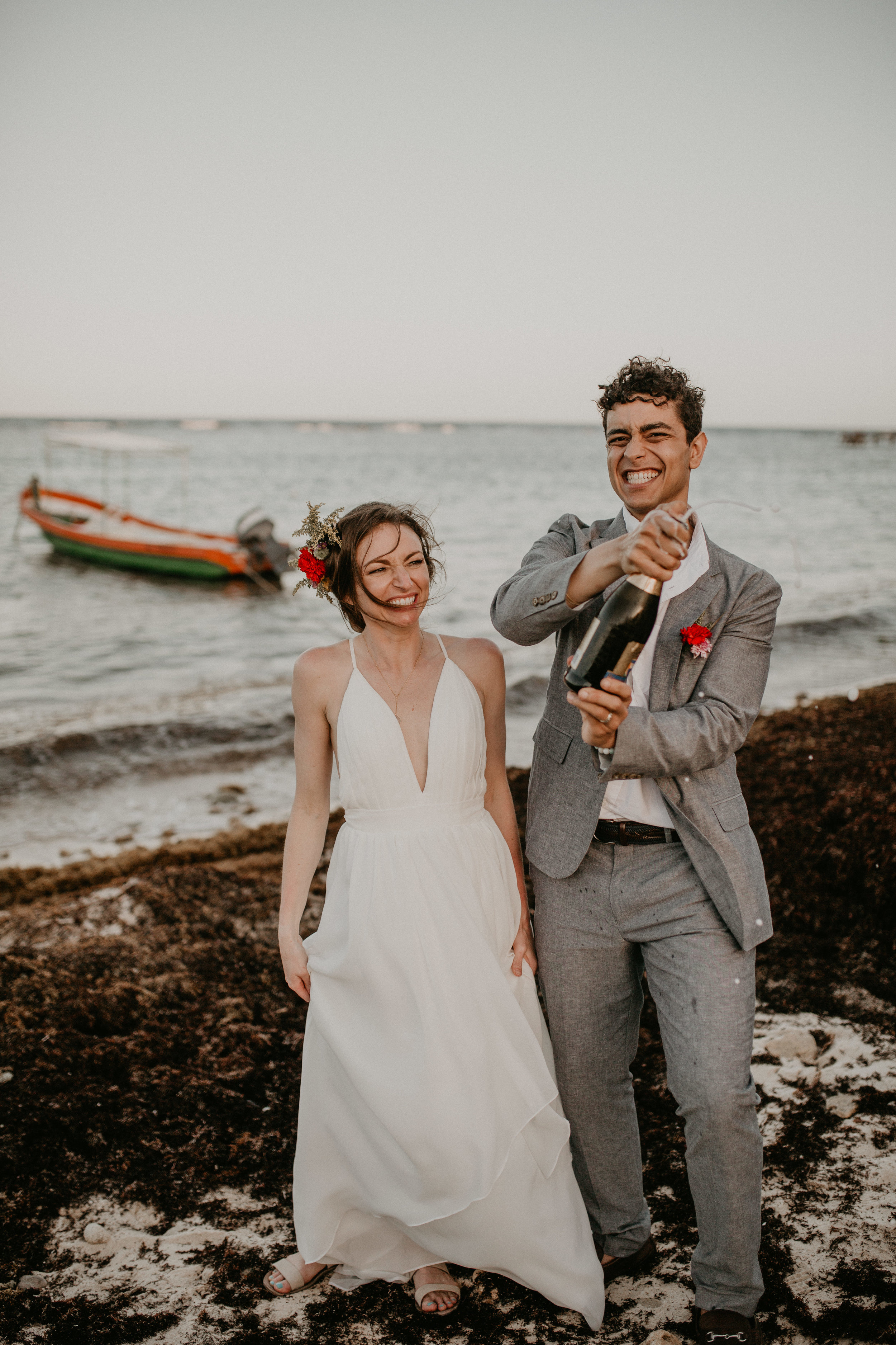 Nicole-Daacke-Photography-beachfront-akumal-destionation-wedding-tulum-mexico-elopement-photographer-destination-wedding-inspiration-sunset-champagne-pop-boho-bride-ocean-tropical-bohemian-tulum-wedding-photos-194.jpg