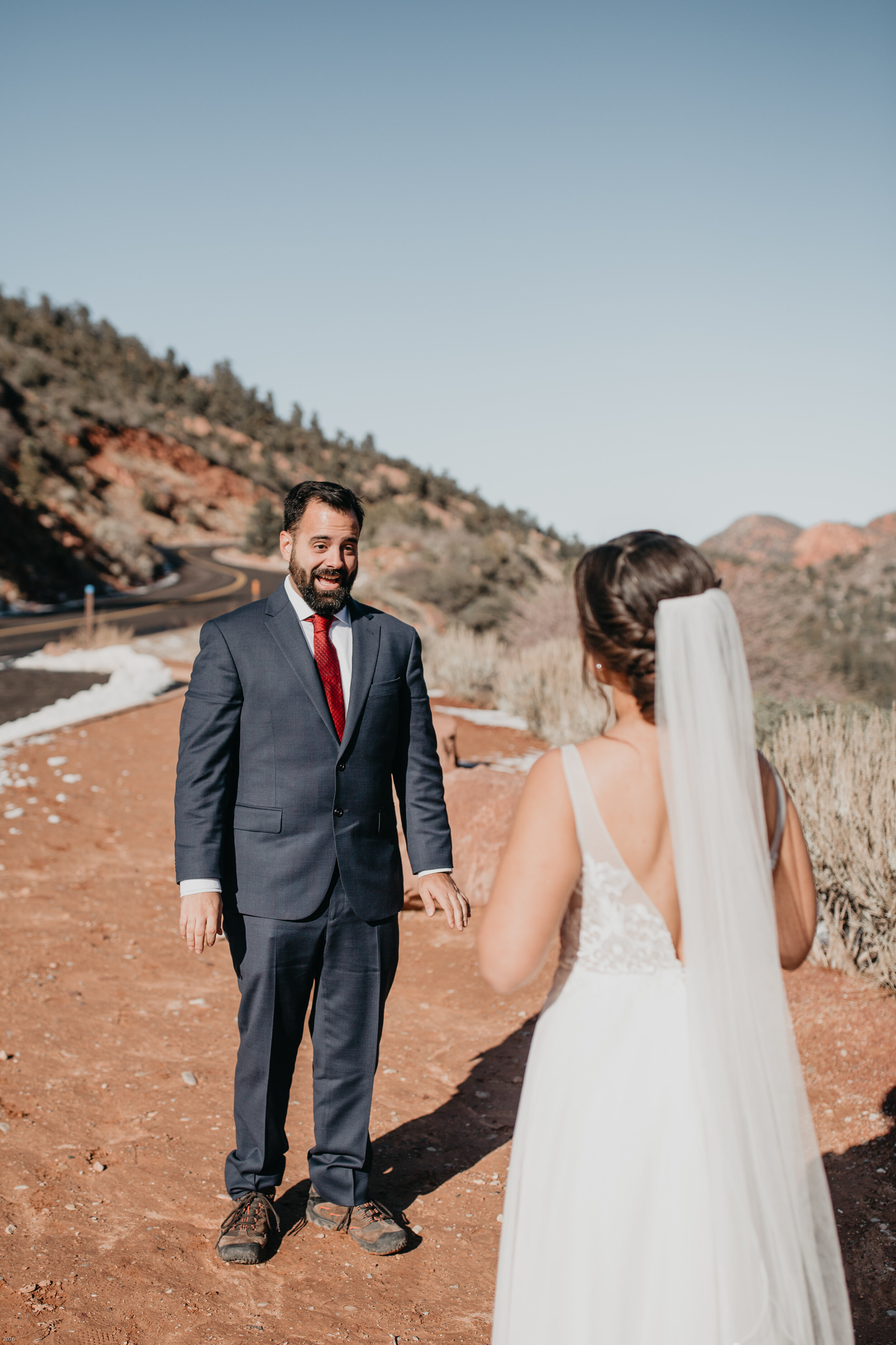 Nicole-Daacke-Photography-snowy-hiking-elopement-in-zion-national-park-zion-elopement-photographer-canyon-overlook-trial-brial-portraits-in-mt-zion-national-park-utah-desert-adventure-elopement-photographer-104.jpg