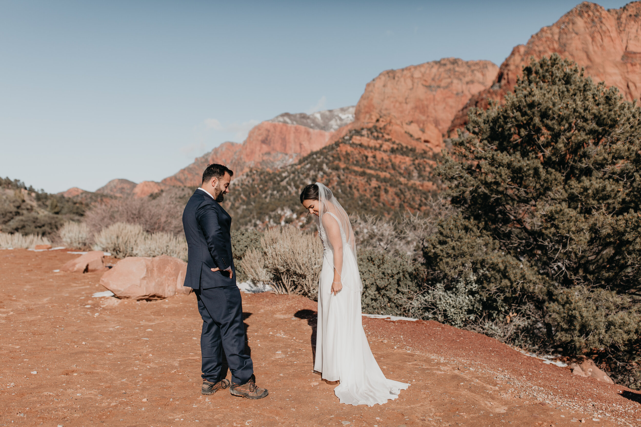 Nicole-Daacke-Photography-snowy-hiking-elopement-in-zion-national-park-zion-elopement-photographer-canyon-overlook-trial-brial-portraits-in-mt-zion-national-park-utah-desert-adventure-elopement-photographer-105.jpg